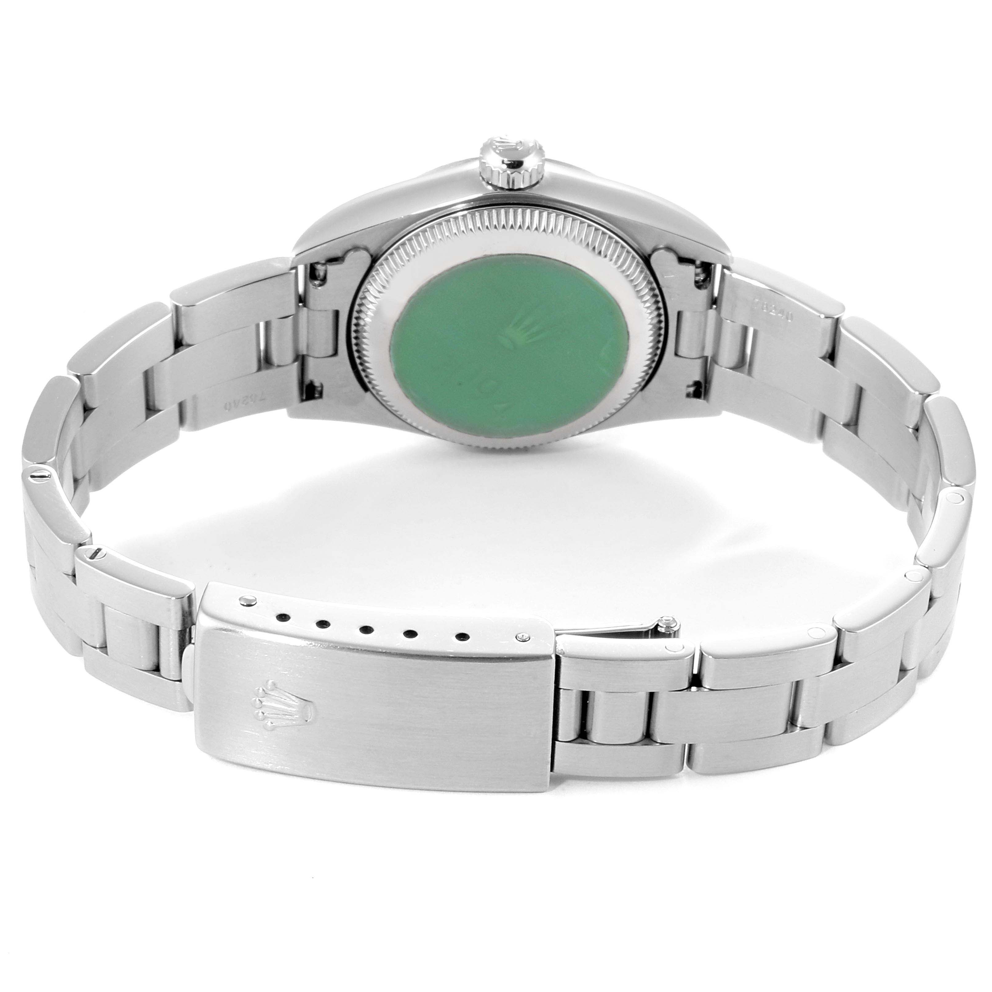 This Rolex Oyster Perpetual 76094 Women's Stainless Steel Pink Dial 76094 Women's Stainless Steel Pink Dial watch is shown from the back, highlighting the bracelet, clasp, and case back.