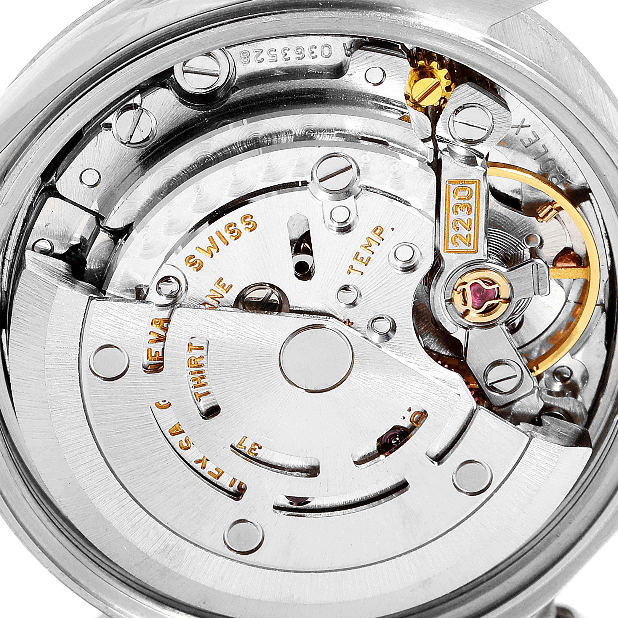 This image shows the inner mechanism and movement components of the Rolex Oyster Perpetual 76094 Women's Stainless Steel Pink Dial 76094 Women's Stainless Steel Pink Dial watch.