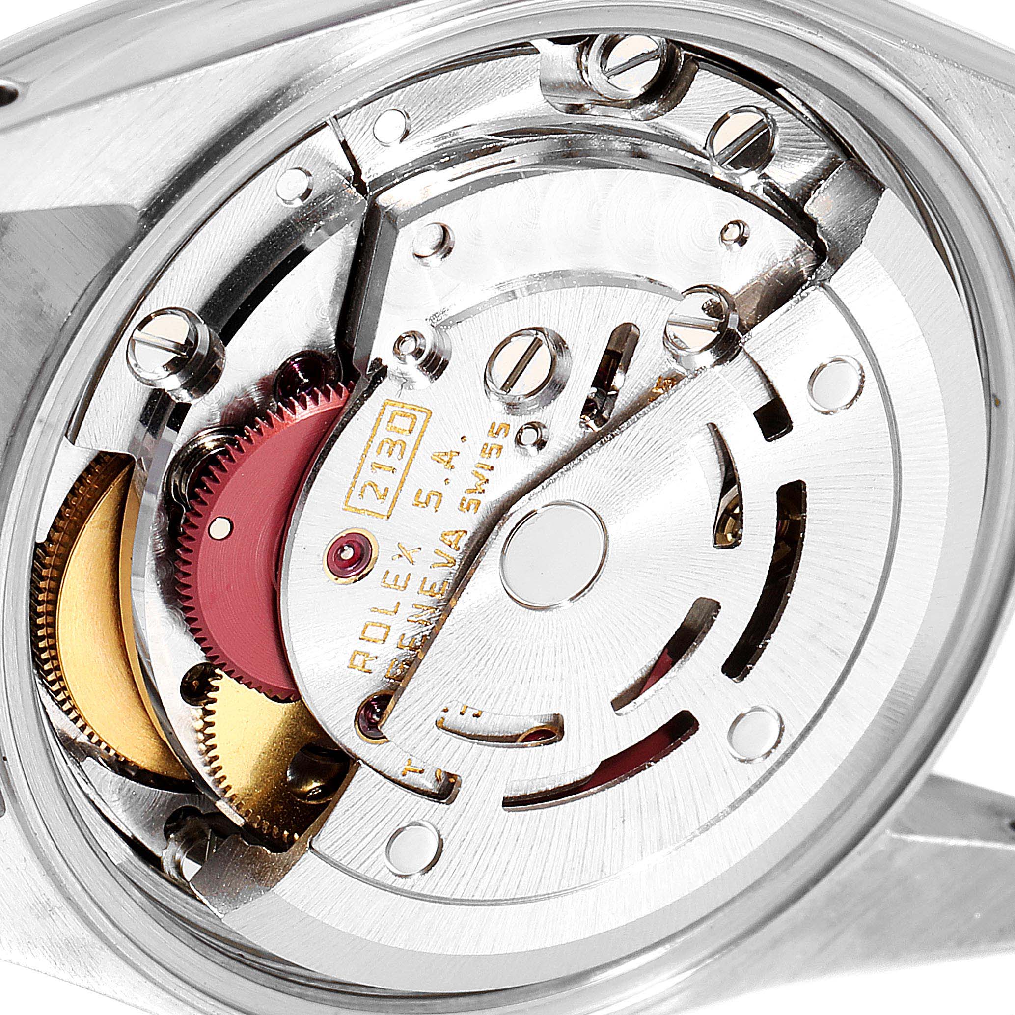 This image shows the internal movement and mechanism of a Rolex Oyster Perpetual 67180 Women's Stainless Steel Silver Dial 67180 Women's Stainless Steel Silver Dial watch from a close-up angle.