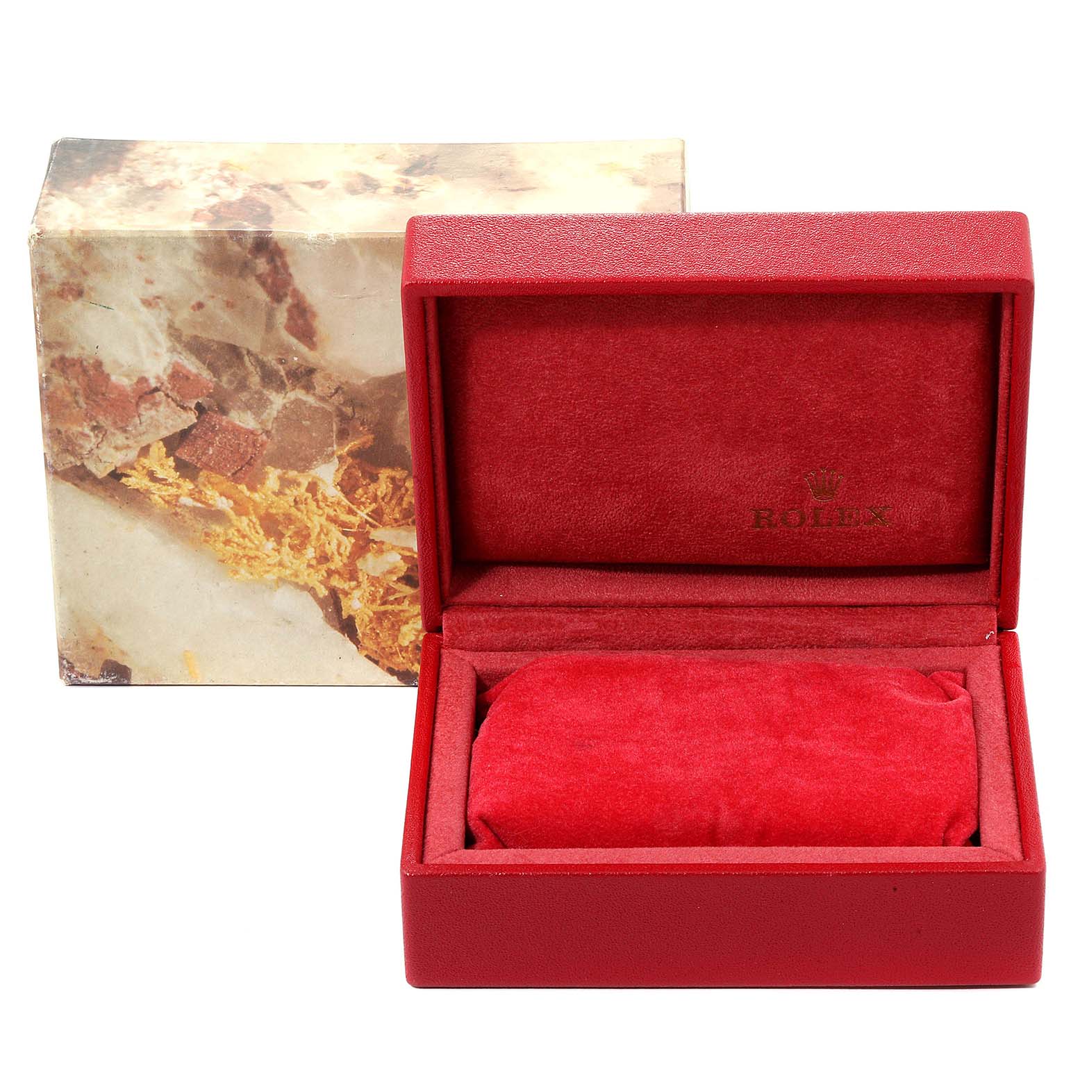 The image shows the red velvet case for the Rolex Oyster Perpetual 67180 Women's Stainless Steel Silver Dial 67180 Women's Stainless Steel Silver Dial watch, with its top cover open and the outer box behind it.