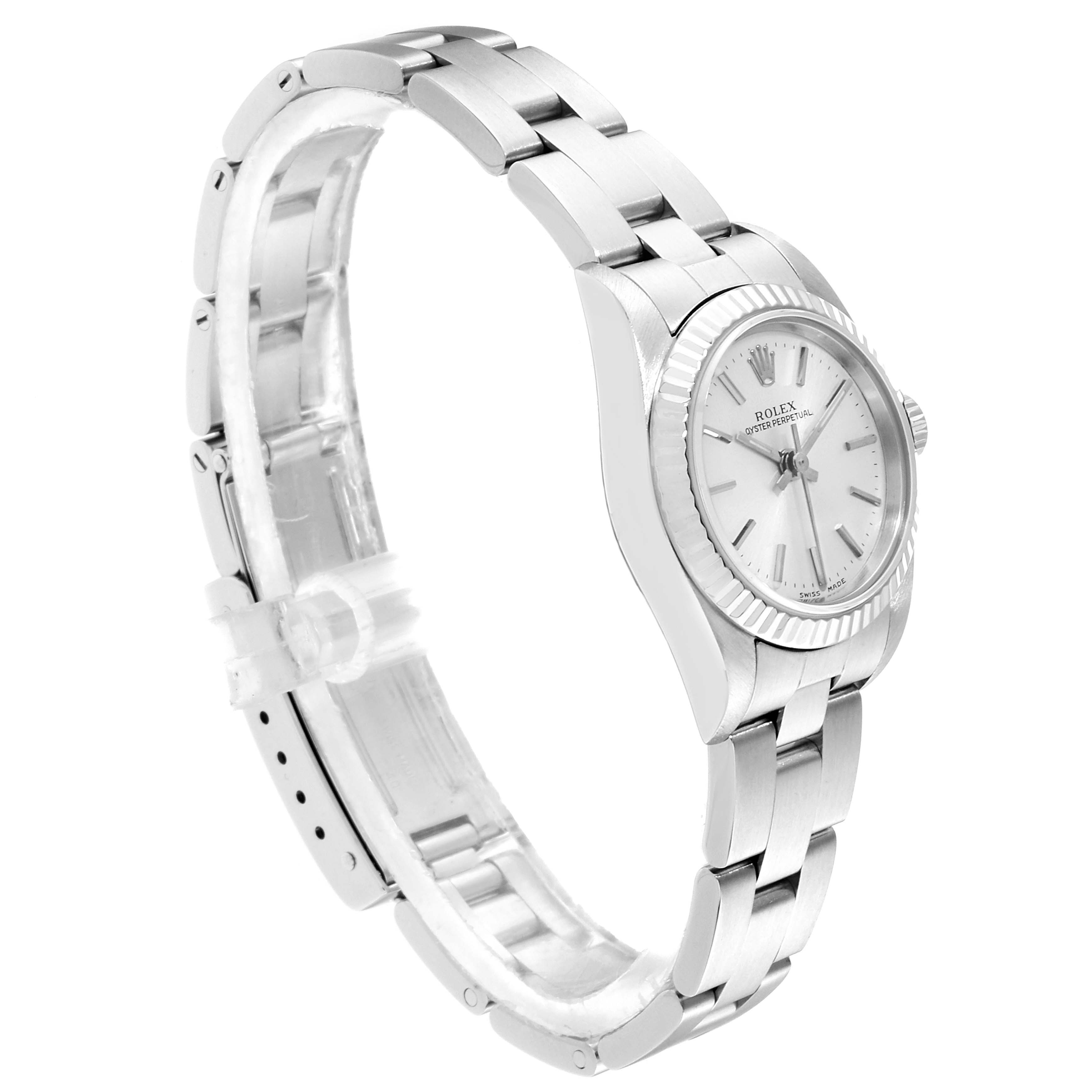 This image shows a Rolex Oyster Perpetual 76094 Women's Stainless Steel Silver Dial 76094 Women's Stainless Steel Silver Dial watch from a side angle, highlighting its bracelet and face.
