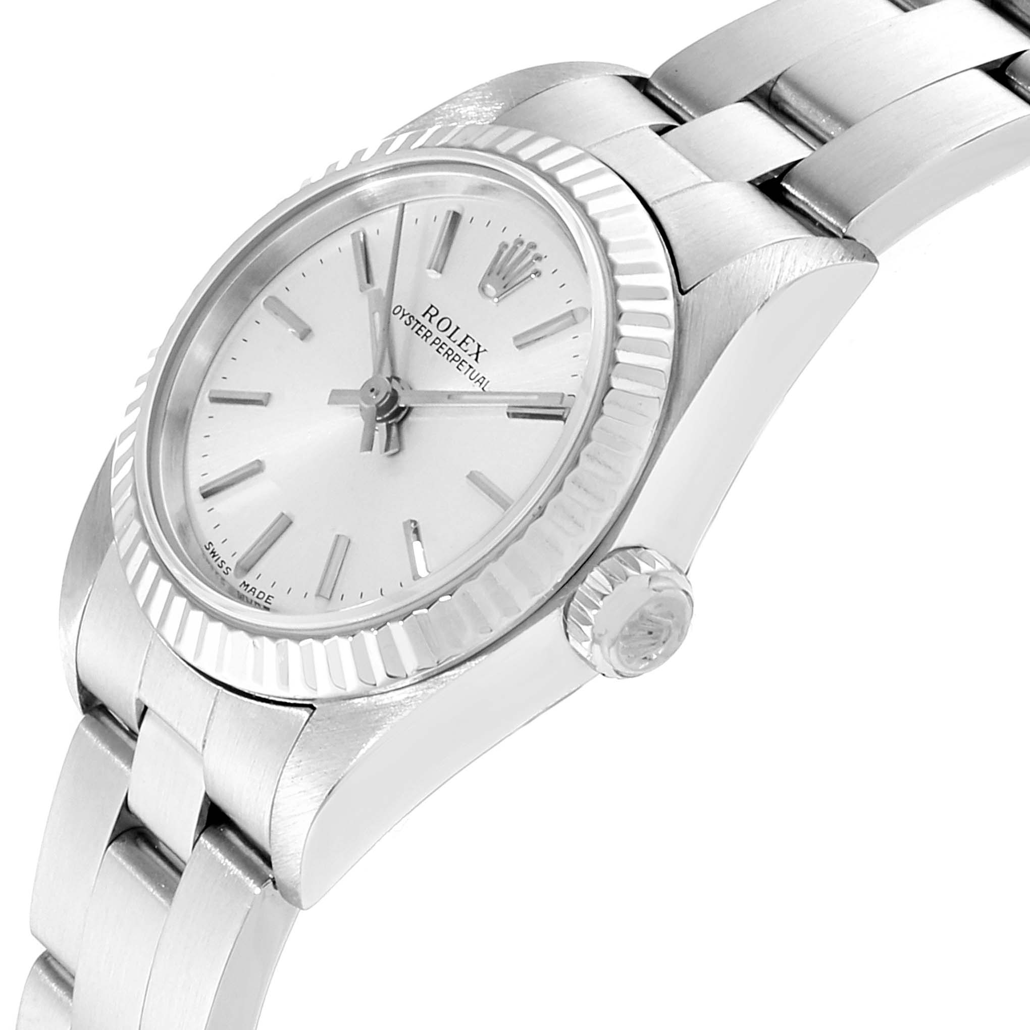 This image shows a partial side view of the Rolex Oyster Perpetual 76094 Women's Stainless Steel Silver Dial 76094 Women's Stainless Steel Silver Dial watch, highlighting the face, bezel, crown, and bracelet.