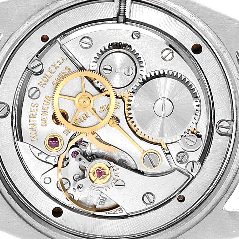 This is a close-up view of the internal mechanical movement of the Rolex Vintage Collection 6694 Men's Stainless Steel Champagne Dial 6694 Men's Stainless Steel Champagne Dial watch, showcasing gears and components.