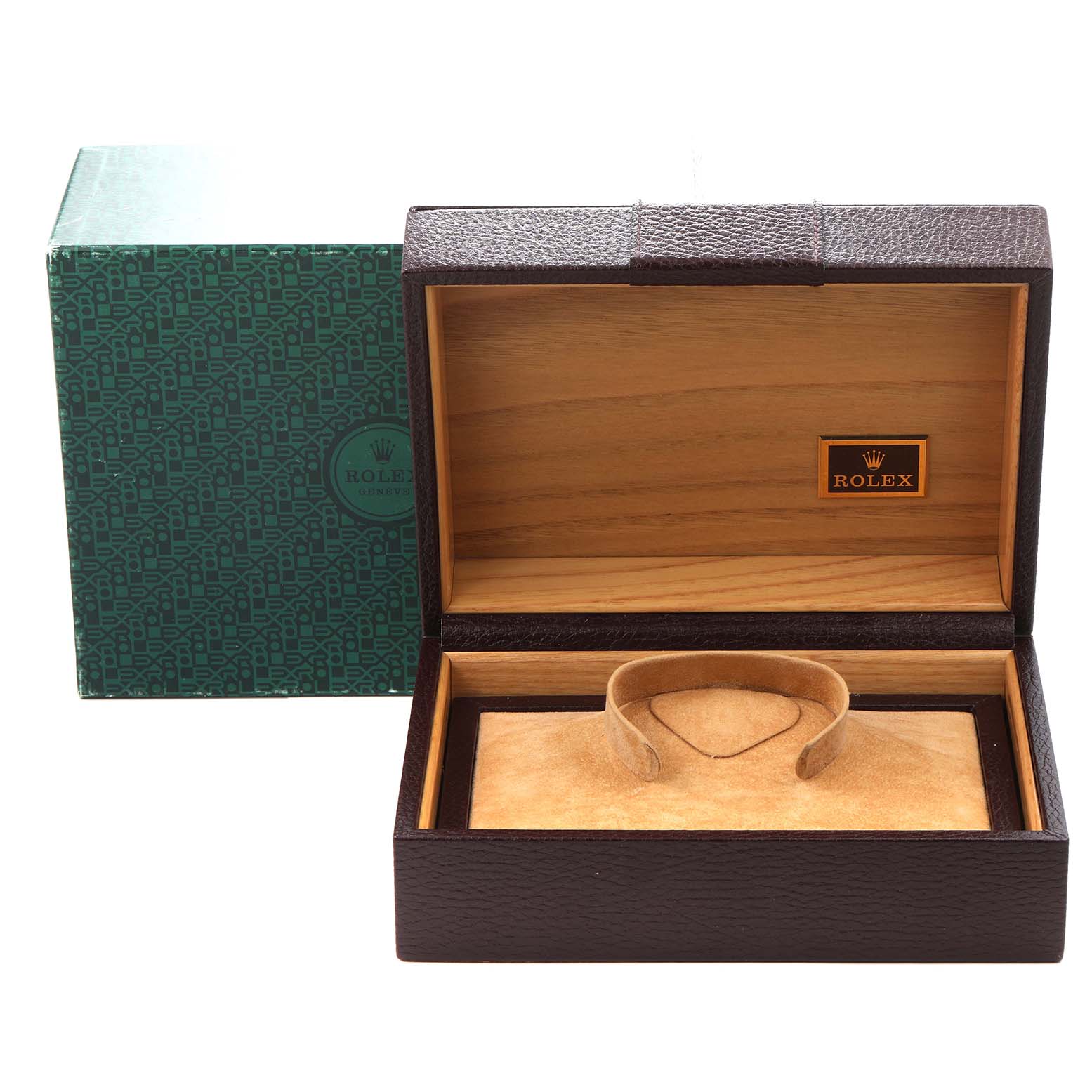 The image shows the open display box for the Rolex Oysterquartz 19091 Men's White Gold Silver Dial 19091 Men's White Gold Silver Dial, featuring a green patterned outer box and a wooden interior with a cushion.