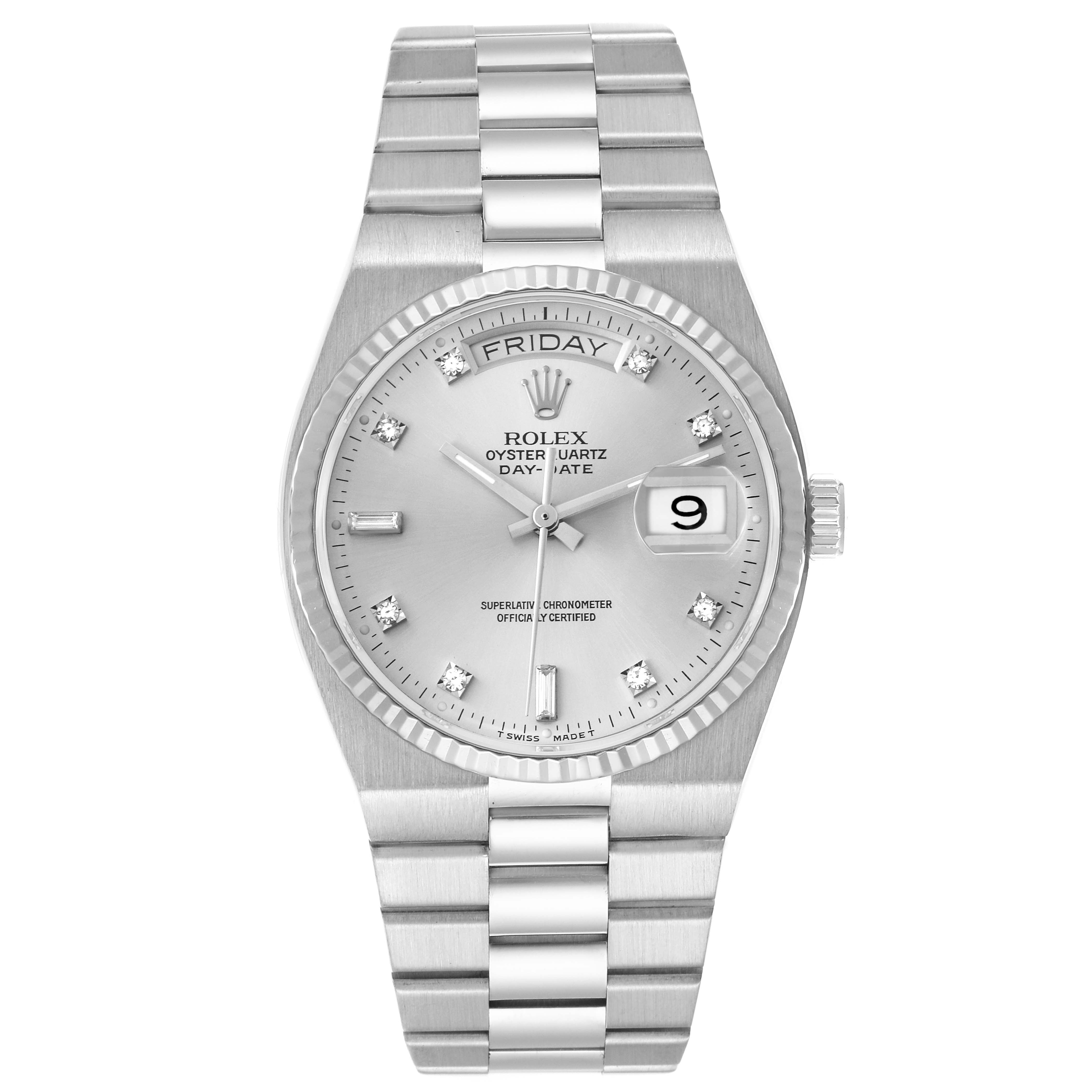 The Rolex Oysterquartz 19091 Men's White Gold Silver Dial 19091 Men's White Gold Silver Dial watch is shown from a top-down angle, highlighting its dial, day-date feature, and integrated bracelet.