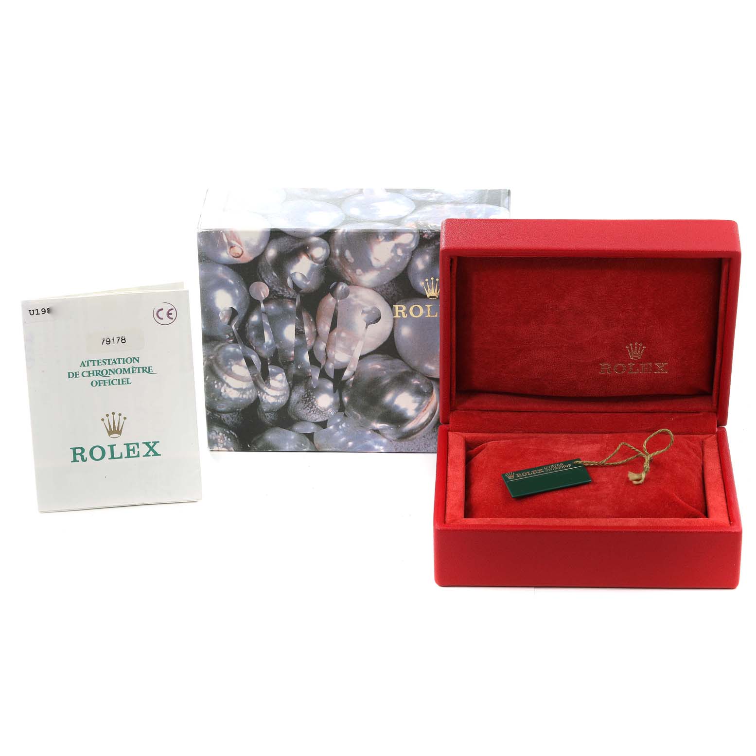 The image shows packaging and documentation for a Rolex President 79178 Women
s Yellow Gold Champagne Dial 79178 Women
s Yellow Gold Champagne Dial model, including a box, tags, and an official certificate.