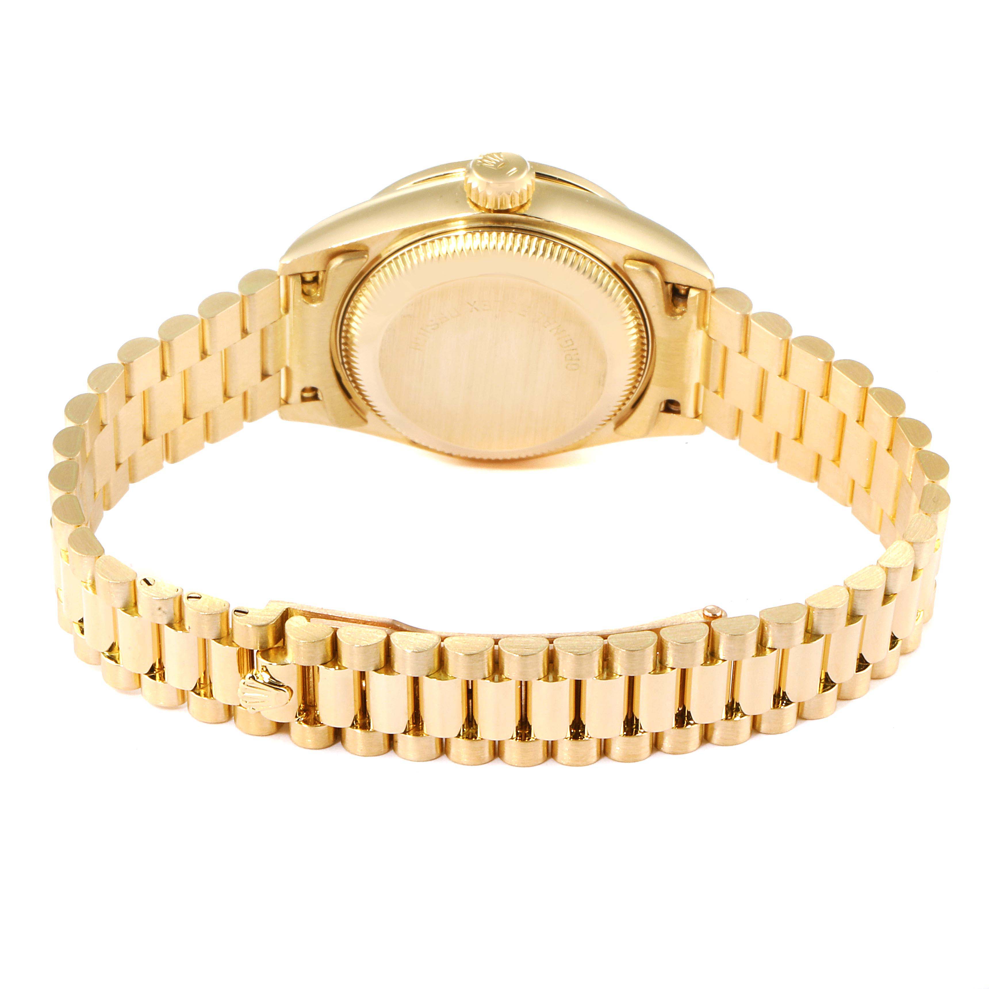 The image shows the back case and bracelet of a Rolex President 69158 Women
s Yellow Gold Champagne Dial 69158 Women
s Yellow Gold Champagne Dial model watch from an angled rear view.
