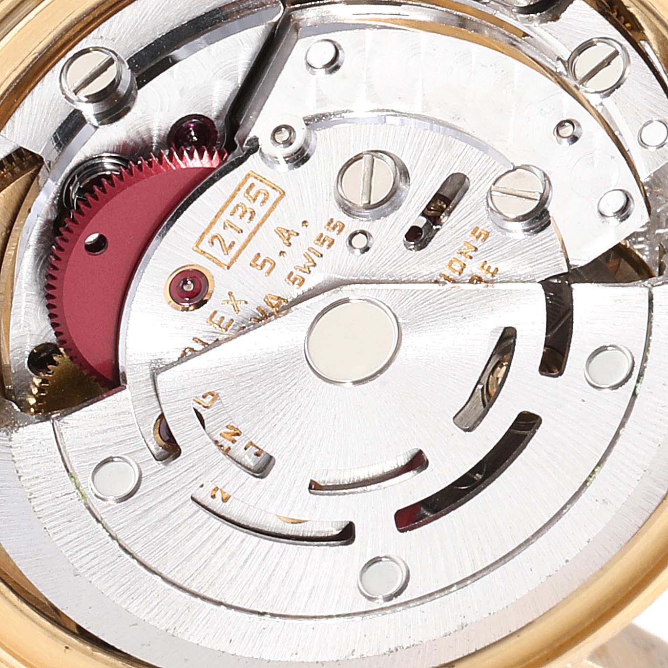 Close-up view of the mechanical movement and rotor of the Rolex President 69158 Women
s Yellow Gold Champagne Dial 69158 Women
s Yellow Gold Champagne Dial model watch.
