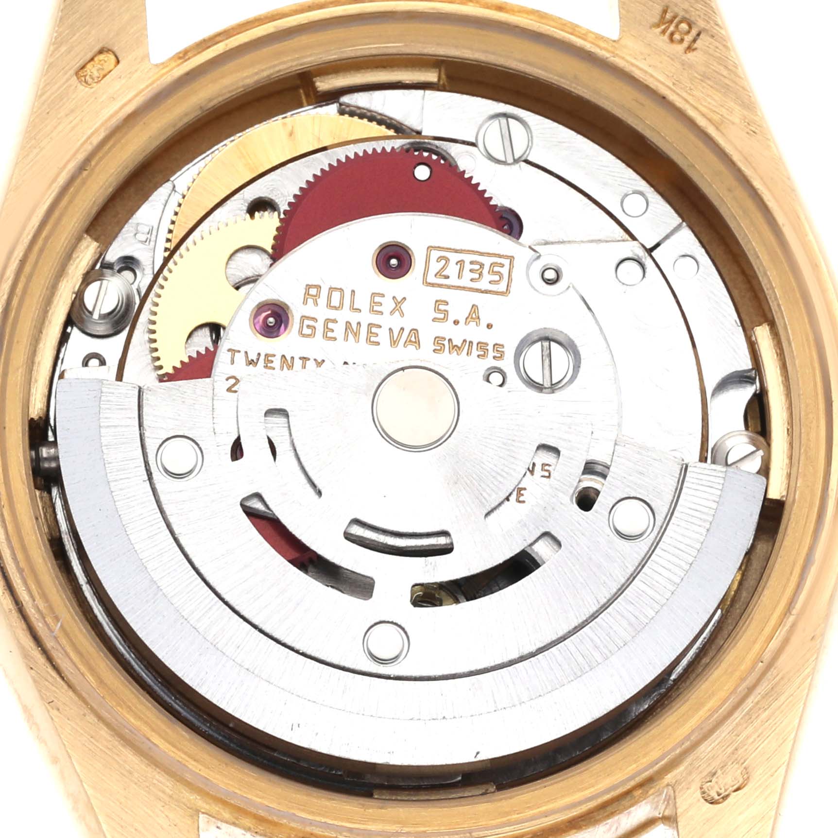 The image shows the back view of a Rolex President 69178 Women's Yellow Gold Champagne Dial 69178 Women's Yellow Gold Champagne Dial model, focusing on its intricate movement mechanism and gears.