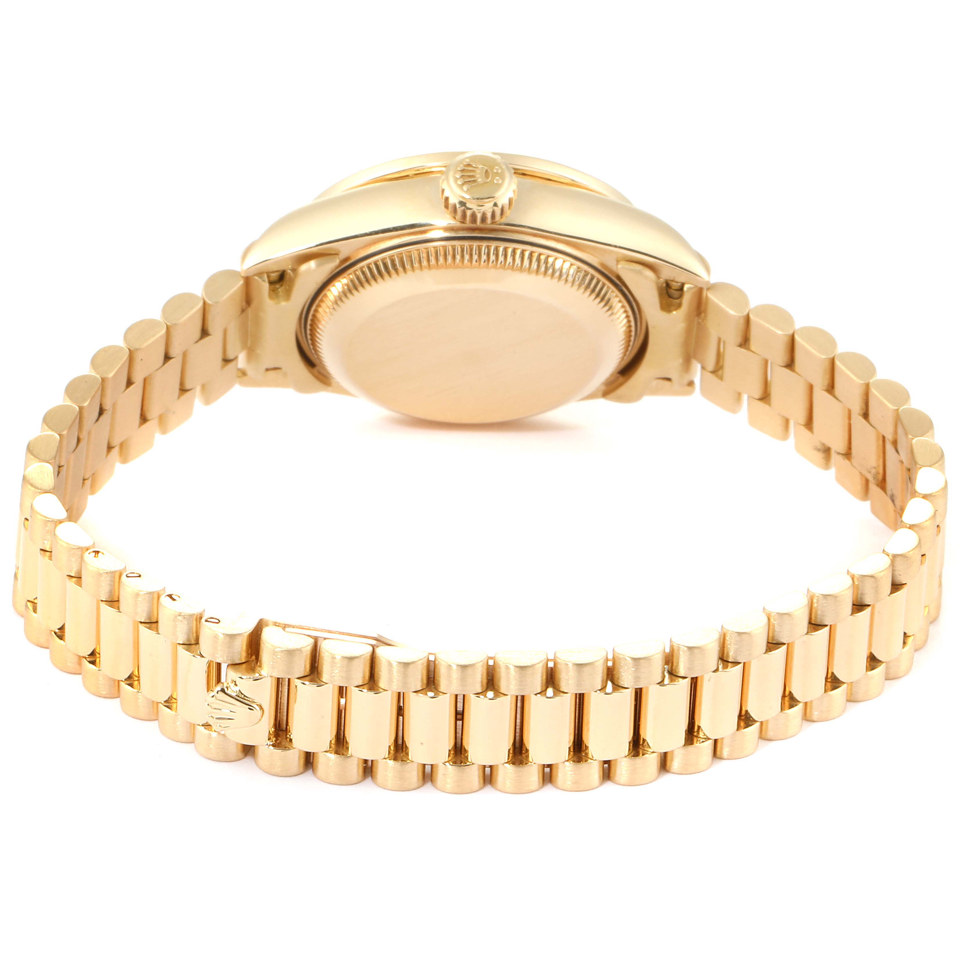 The image shows the back view of a Rolex President 79138 Women
s Yellow Gold Silver Dial 79138 Women
s Yellow Gold Silver Dial model watch, highlighting its case back and bracelet.