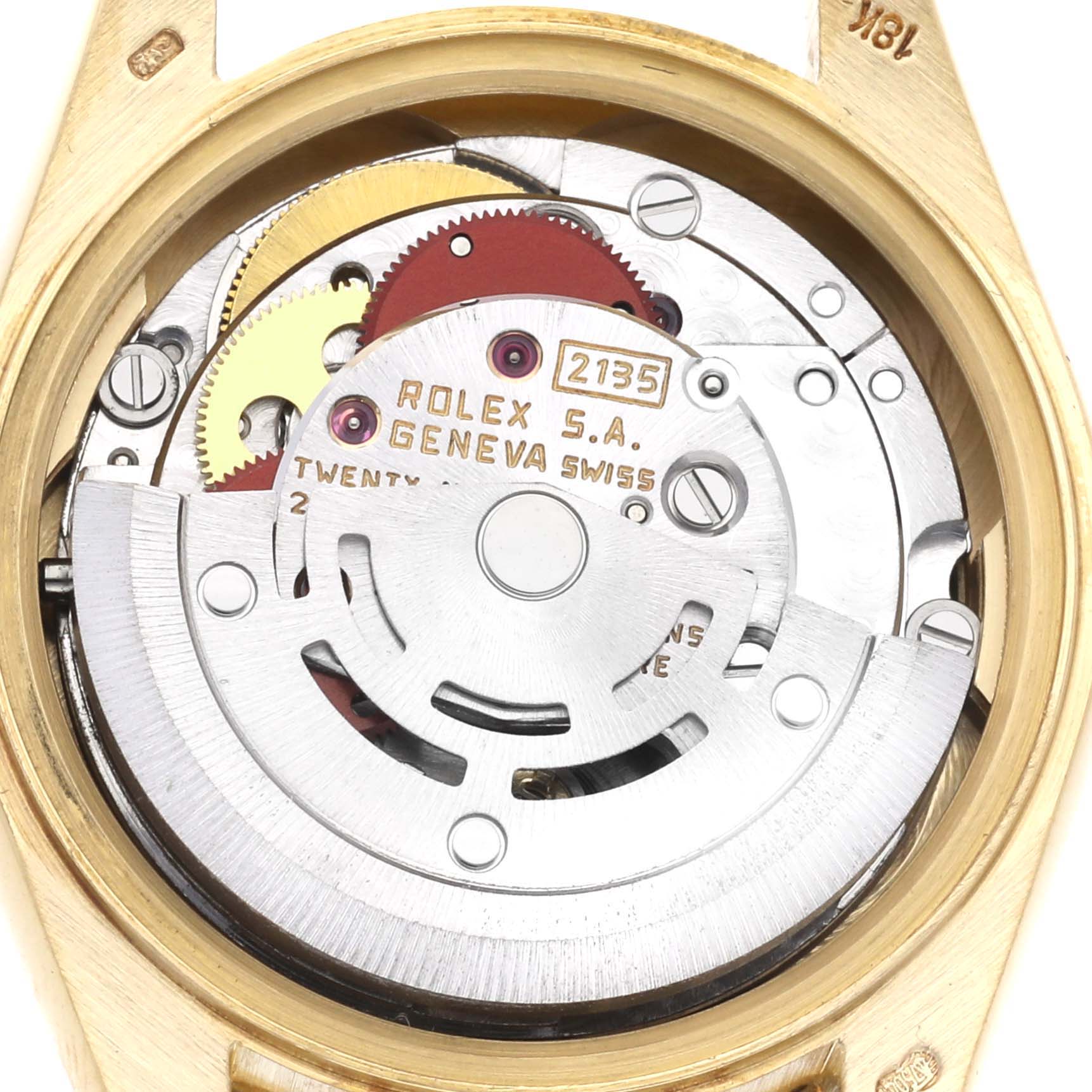 The image shows the movement of a Rolex President 69068 Women's Yellow Gold Champagne Dial 69068 Women's Yellow Gold Champagne Dial model, focusing on its intricate internal mechanics from a top-down angle.