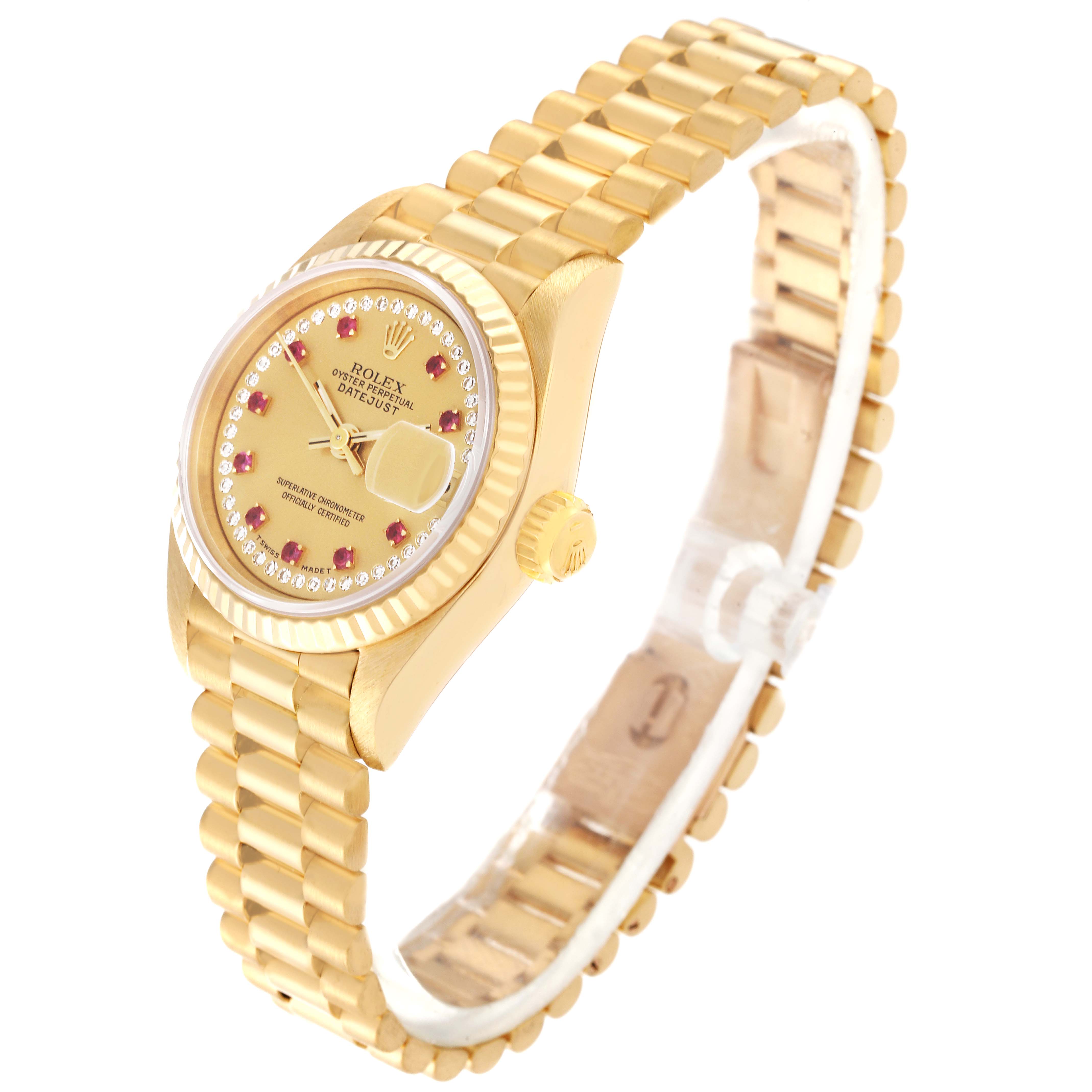 The image shows a Rolex President 69178 Women's Yellow Gold Champagne Dial 69178 Women's Yellow Gold Champagne Dial model watch, angled to display its gold case, bracelet, and dial with ruby hour markers.