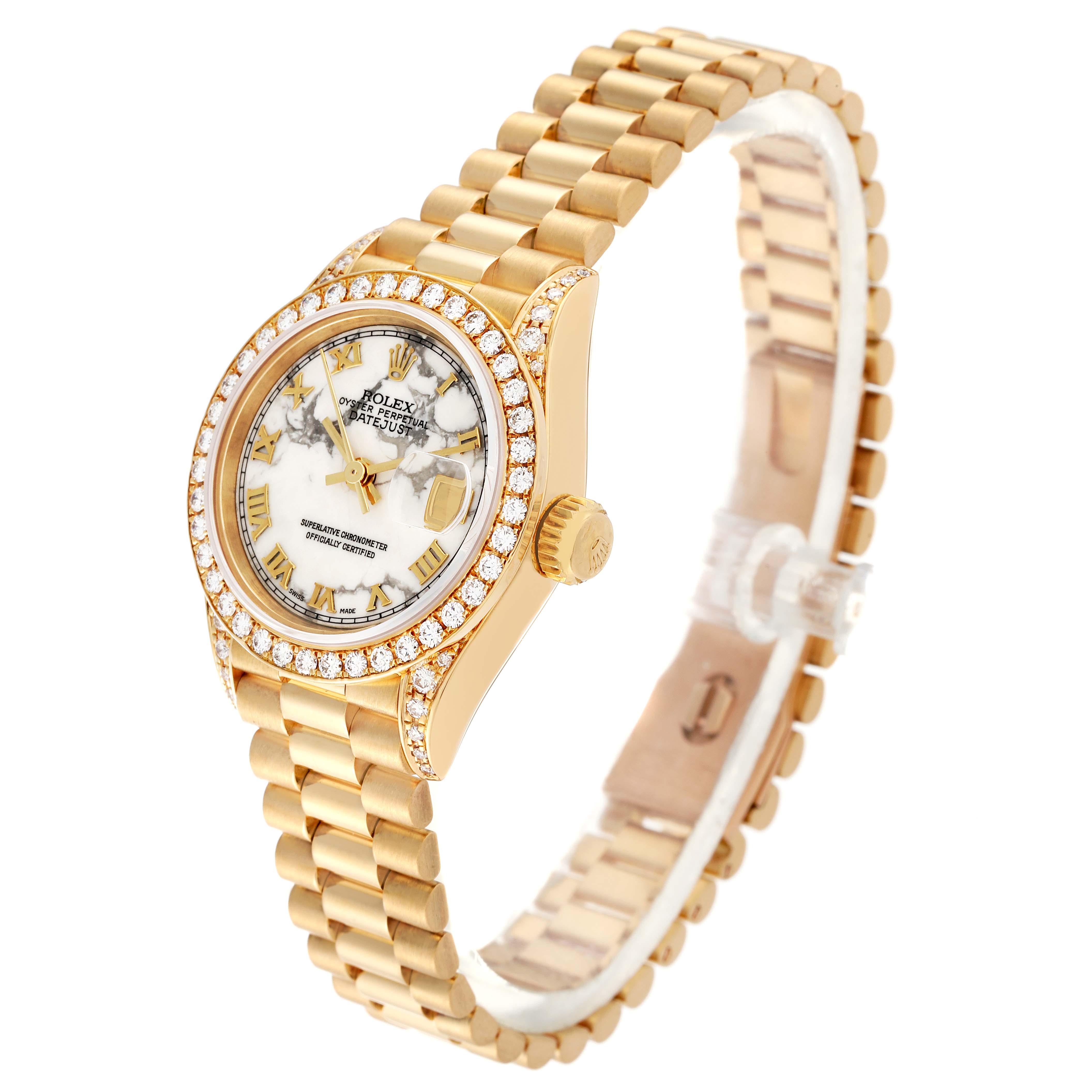 The Rolex President 69158 Women's Yellow Gold White Dial 69158 Women's Yellow Gold White Dial model watch is shown at a slight angle, displaying the face, bezel, and part of the bracelet band.