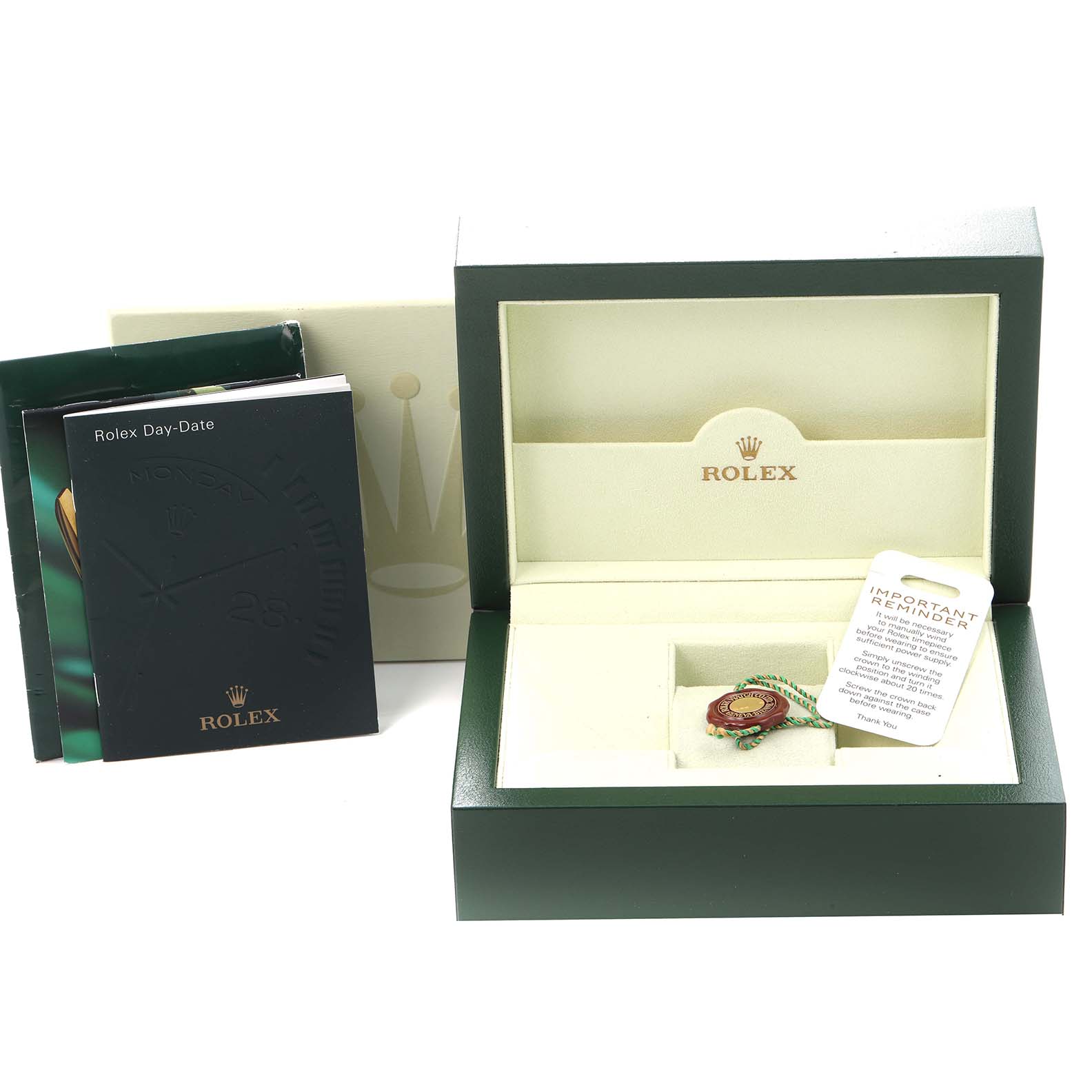 The image shows a Rolex President 118235 Men's Rose Gold Black Dial 118235 Men's Rose Gold Black Dial model watch box, with booklets and a tag inside.