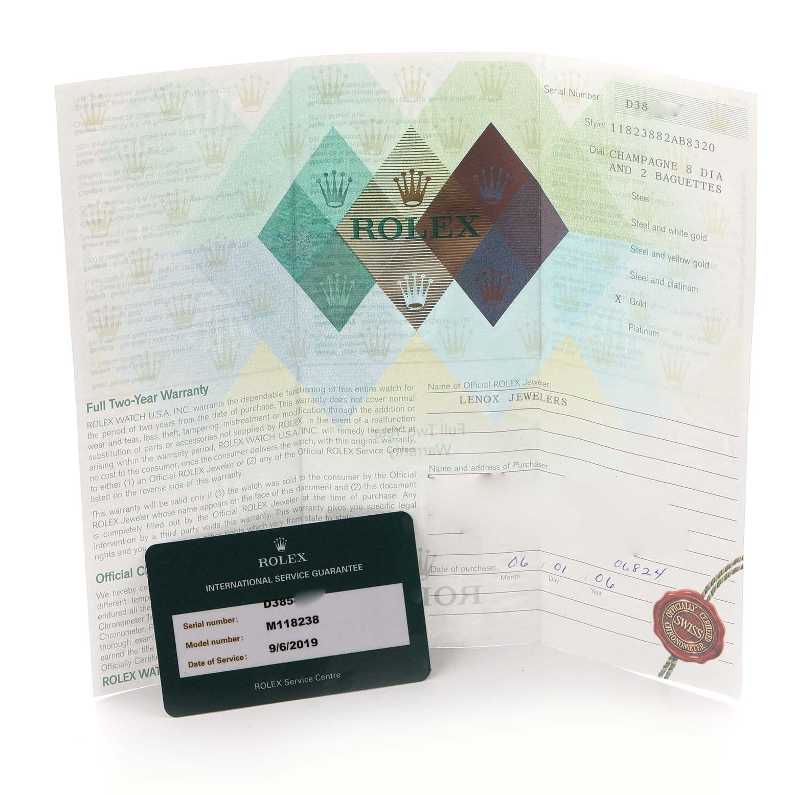 The image shows a Rolex President 118238 Men's Yellow Gold White Dial 118238 Men's Yellow Gold White Dial model's warranty papers and an international service guarantee card.