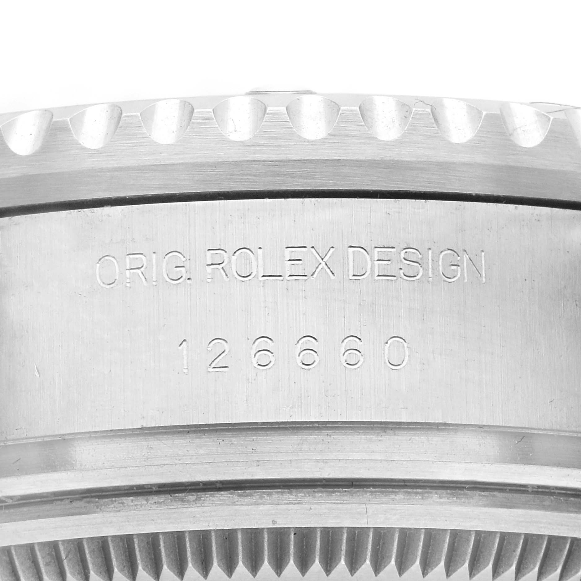 The image shows the engraved side and edge of the Rolex Sea-Dweller 126660 Men's Stainless Steel Blue Dial 126660 Men's Stainless Steel Blue Dial model, highlighting the "ORIG. ROLEX DESIGN" and model number.