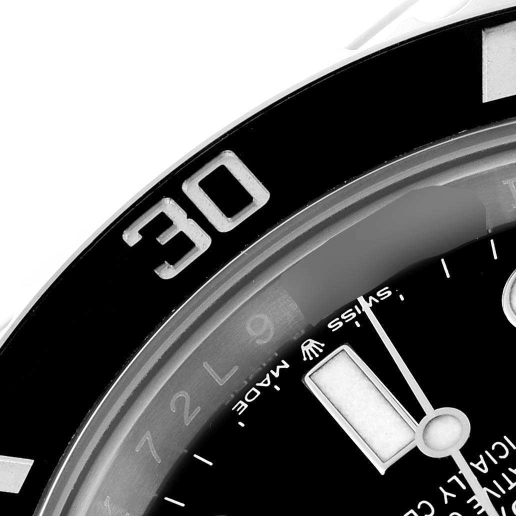 This close-up image shows the dial and part of the bezel of a Rolex Submariner 126610 Men
s Stainless Steel Black Dial 126610 Men
s Stainless Steel Black Dial watch, highlighting the "30" minute marker.