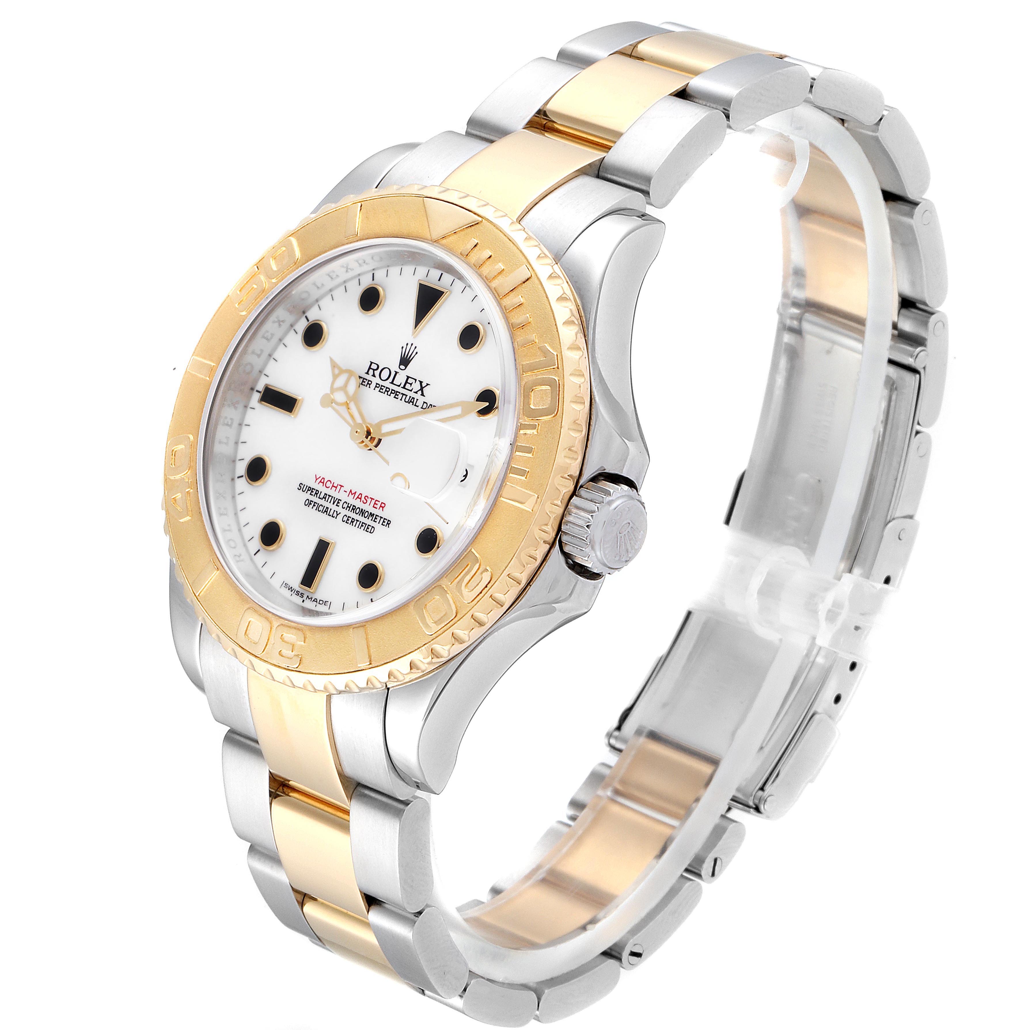 The image shows a Rolex Yacht-Master 16623 Men's Steel and Gold (two tone) White Dial 16623 Men's Steel and Gold (two tone) White Dial watch at a three-quarter angle, highlighting its bezel, dial, and two-tone bracelet.