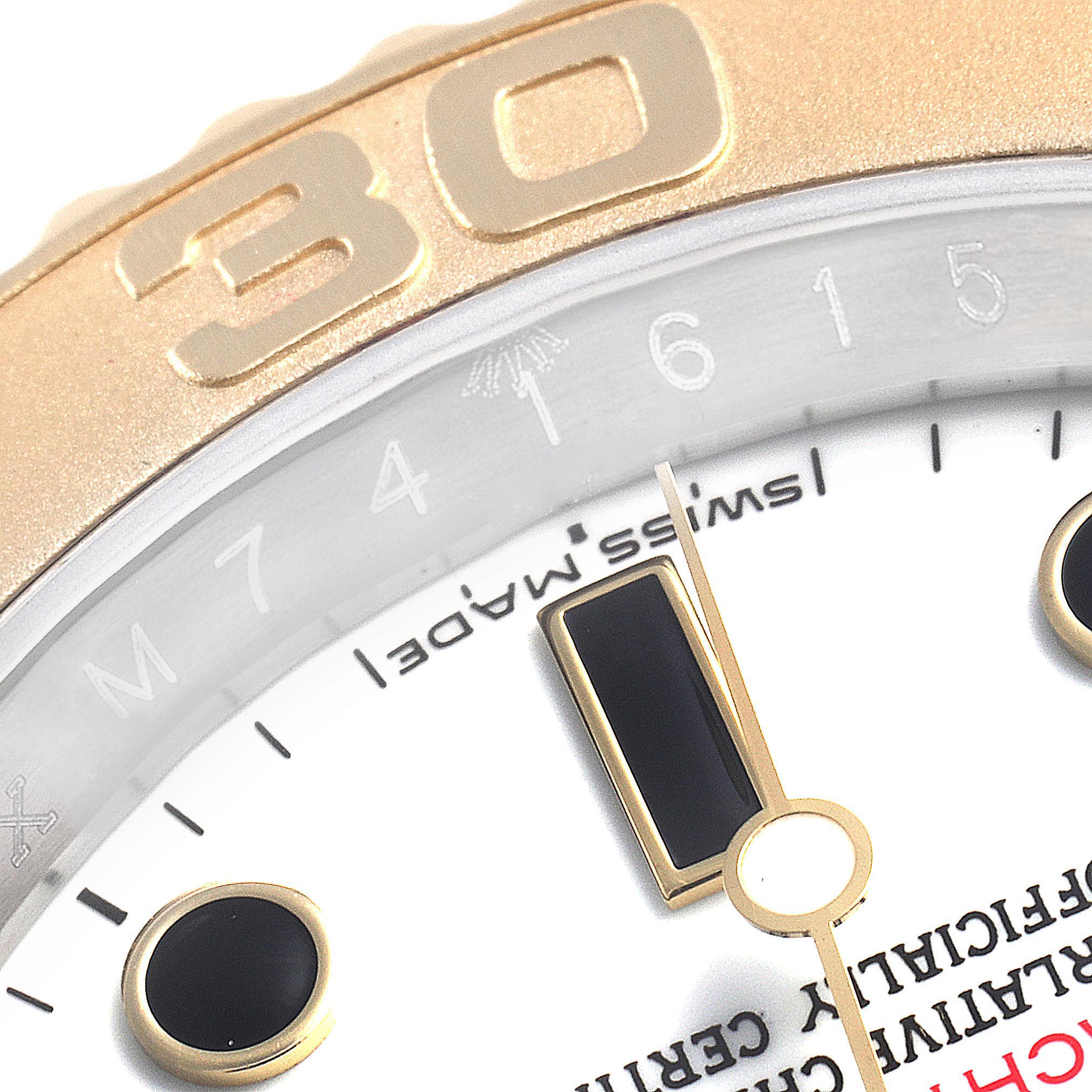 The image shows a close-up of the dial and bezel of a Rolex Yacht-Master 16623 Men's Steel and Gold (two tone) White Dial 16623 Men's Steel and Gold (two tone) White Dial watch.