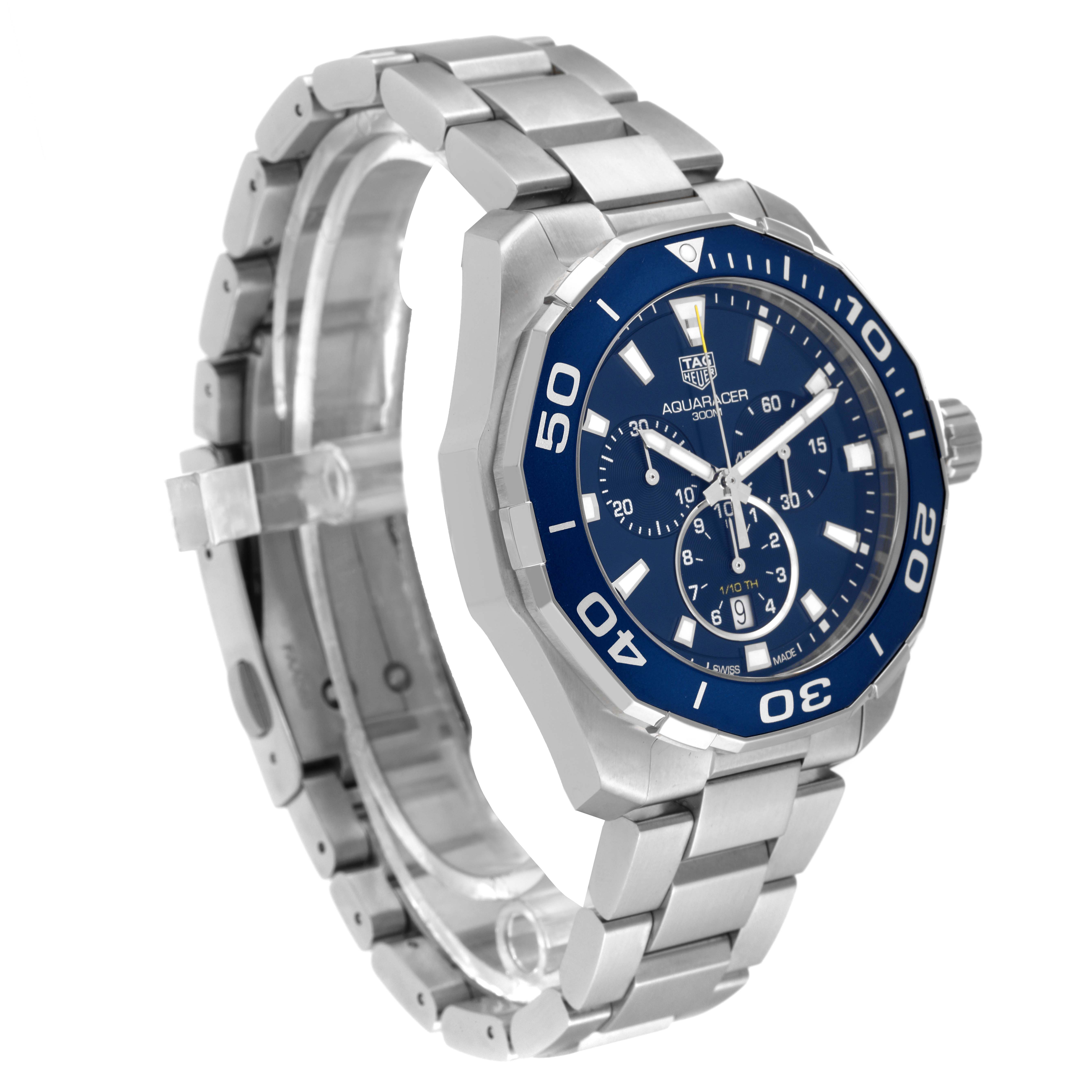 The image shows a Tag Heuer Aquaracer CAY111B.BA0927 Men's Stainless Steel Blue Dial CAY111B.BA0927 Men's Stainless Steel Blue Dial watch at a three-quarter angle, highlighting its blue dial, bezel, and metal bracelet.