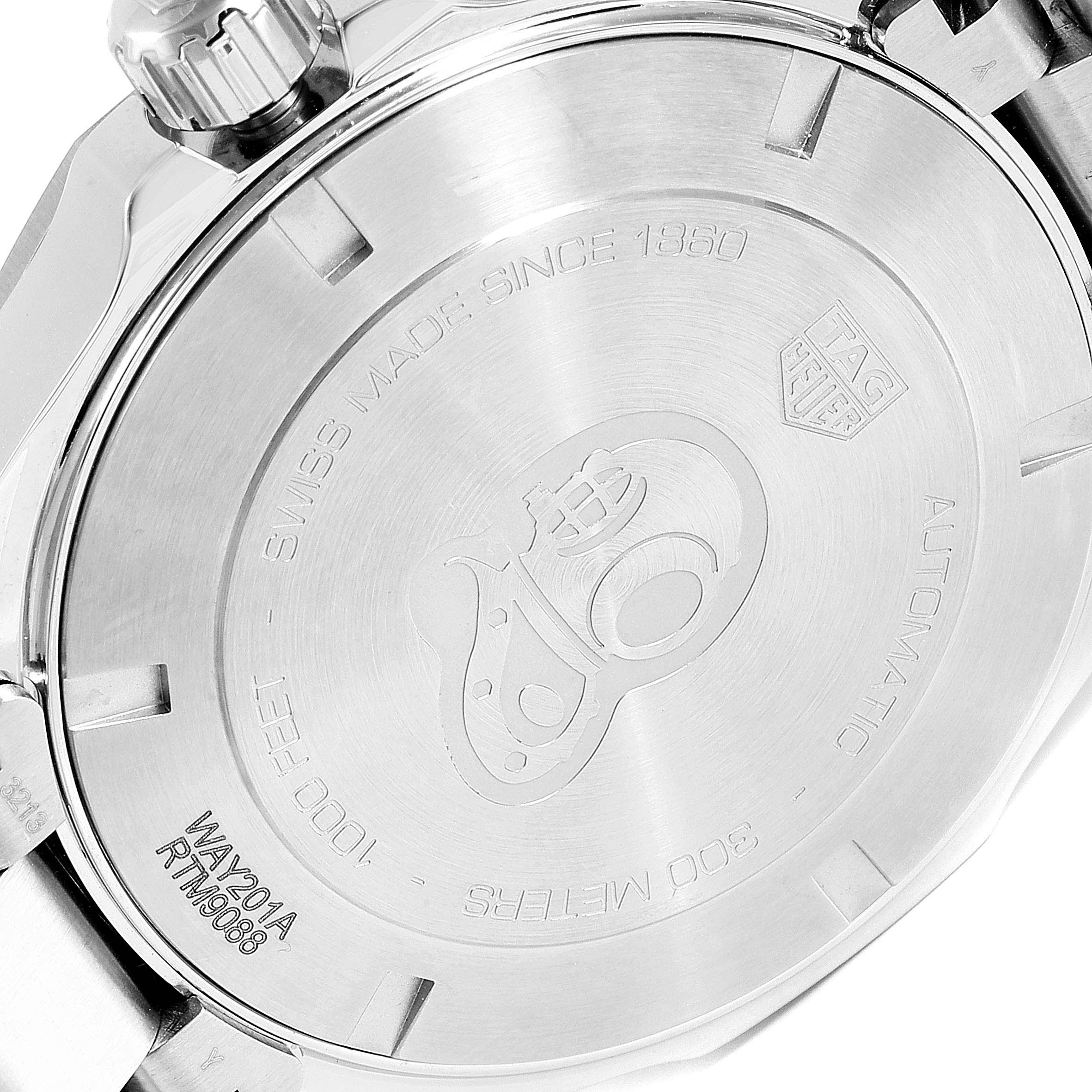 The image shows the back casing and crown of a Tag Heuer Aquaracer WAY201A.BA0927 Men
s Stainless Steel Black Dial WAY201A.BA0927 Men
s Stainless Steel Black Dial watch.