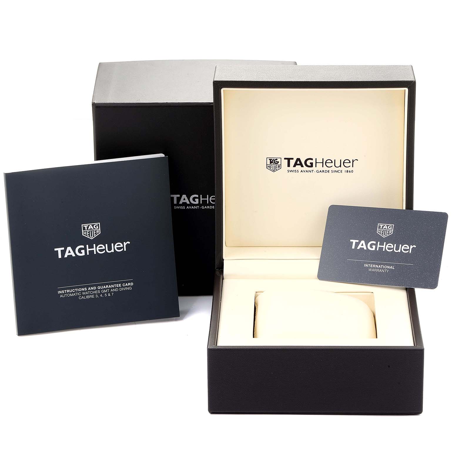 This image shows the open box, manual, and warranty card for the Tag Heuer Aquaracer WAY201A.BA0927 Men
s Stainless Steel Black Dial WAY201A.BA0927 Men
s Stainless Steel Black Dial watch model.