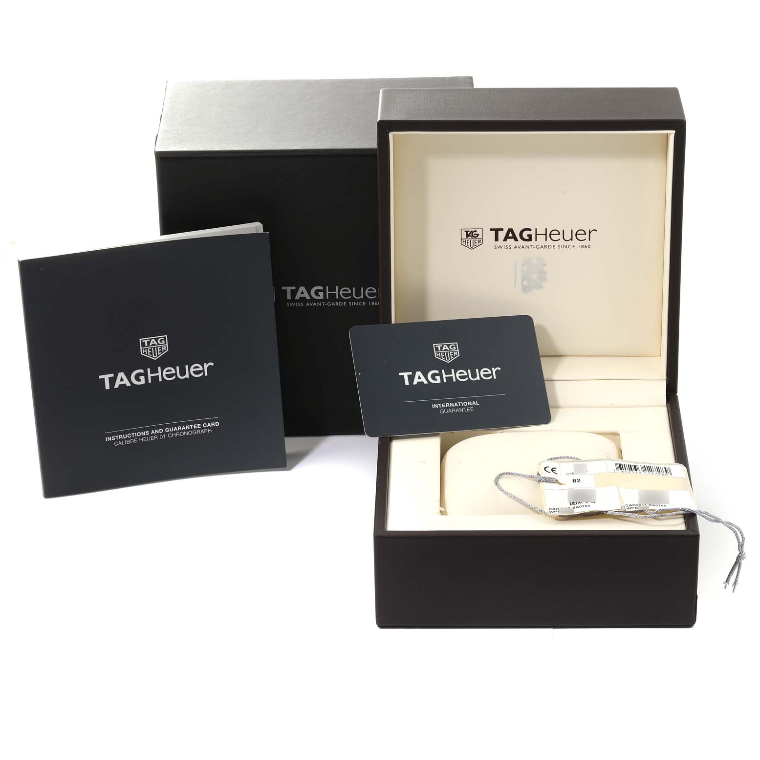 The image shows an open Tag Heuer Carrera CAR201T.BA0766 Men's Stainless Steel Blue Dial CAR201T.BA0766 Men's Stainless Steel Blue Dial watch box, instructions booklet, and international guarantee card.