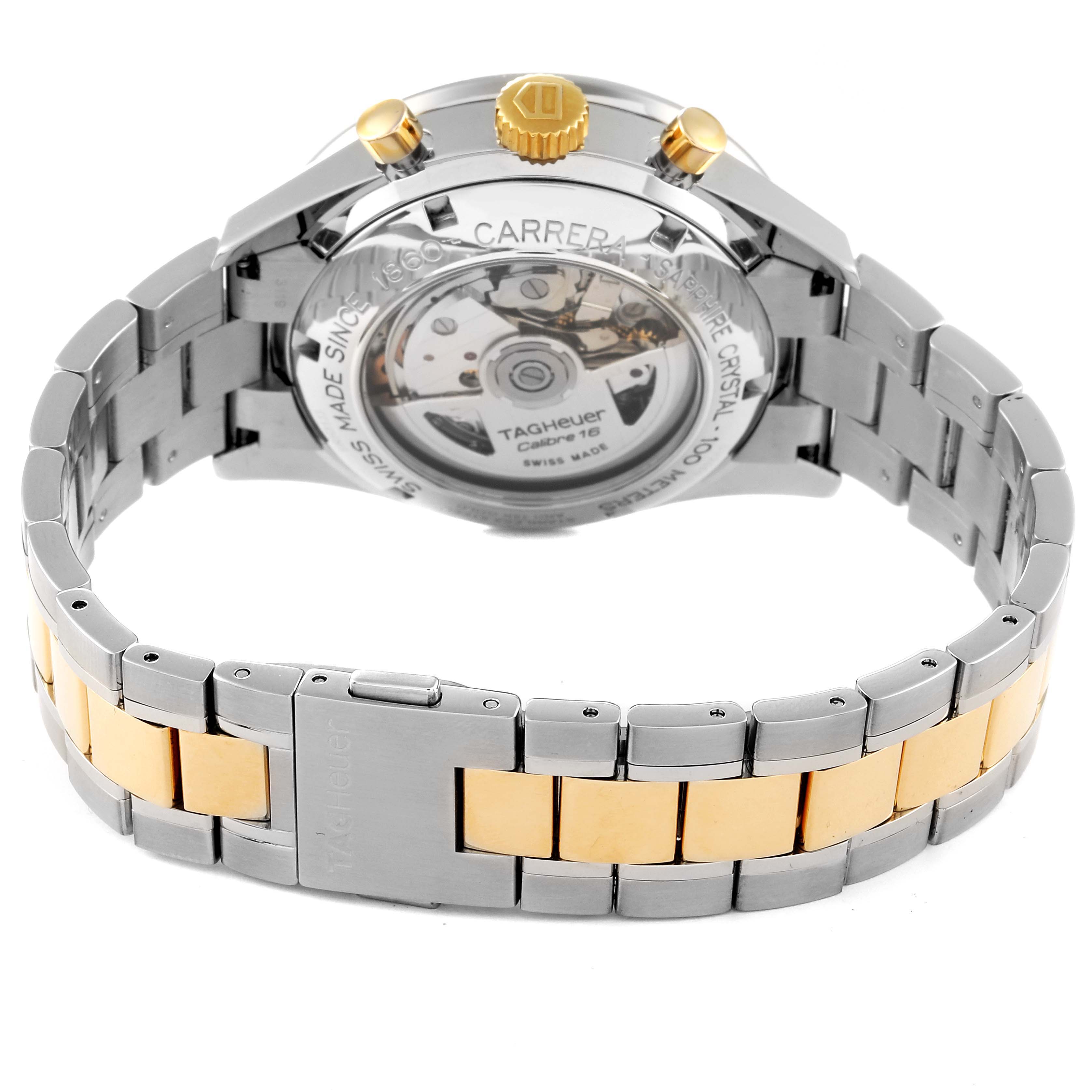 The image shows the back view of the Tag Heuer Carrera CV2050.BD0789 Men's Steel and Gold (two tone) Silver Dial CV2050.BD0789 Men's Steel and Gold (two tone) Silver Dial watch, highlighting the movement mechanism and the two-tone bracelet.