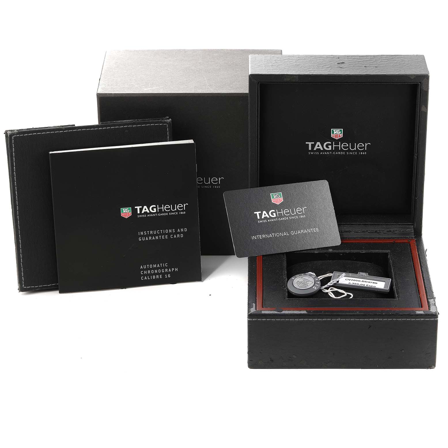 The image shows the packaging, instruction manual, international guarantee card, and presentation box for the Tag Heuer Carrera CV2050.BD0789 Men's Steel and Gold (two tone) Silver Dial CV2050.BD0789 Men's Steel and Gold (two tone) Silver Dial model.