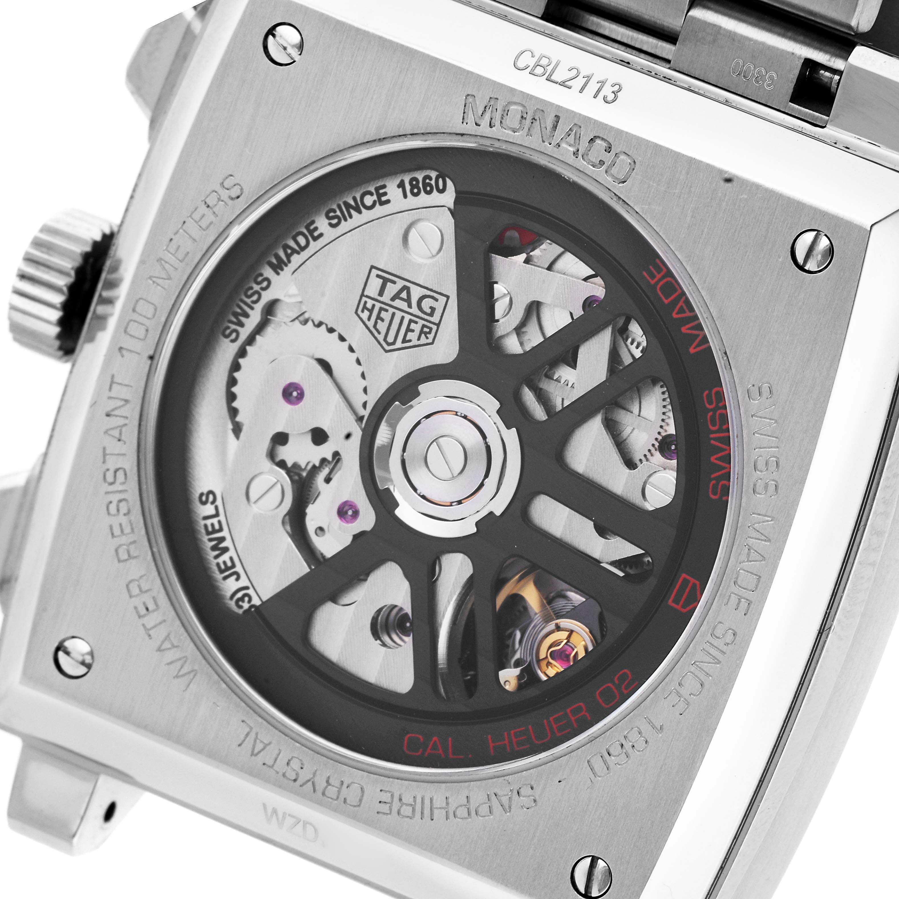 The image shows the back of a Tag Heuer Monaco CBL2113 Men
s Stainless Steel Black Dial CBL2113 Men
s Stainless Steel Black Dial watch, highlighting its automatic movement and sapphire crystal case back.