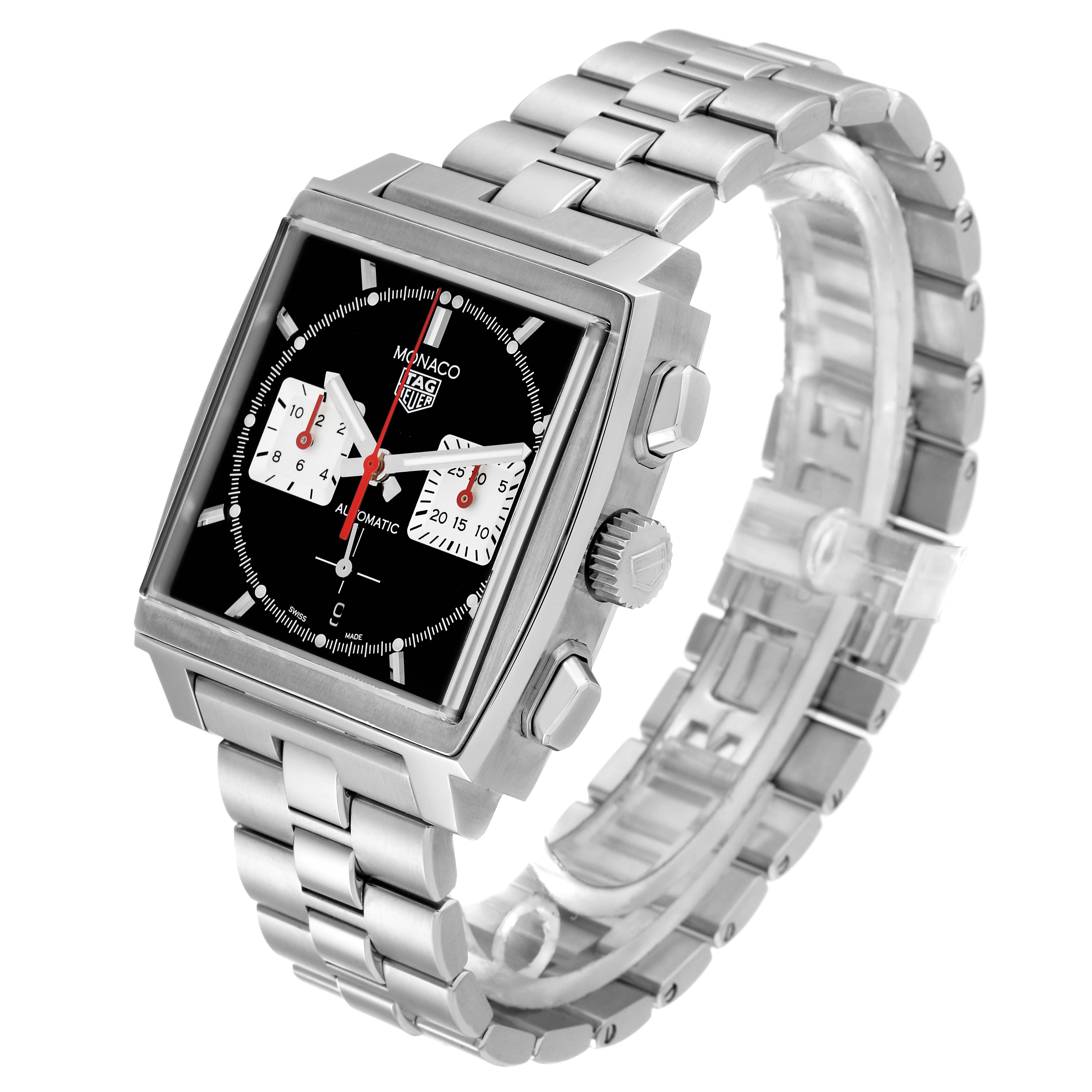 The image shows a Tag Heuer Monaco CBL2113 Men's Stainless Steel Black Dial watch at an angled front view, highlighting its face, crown, pushers, and metal bracelet.
