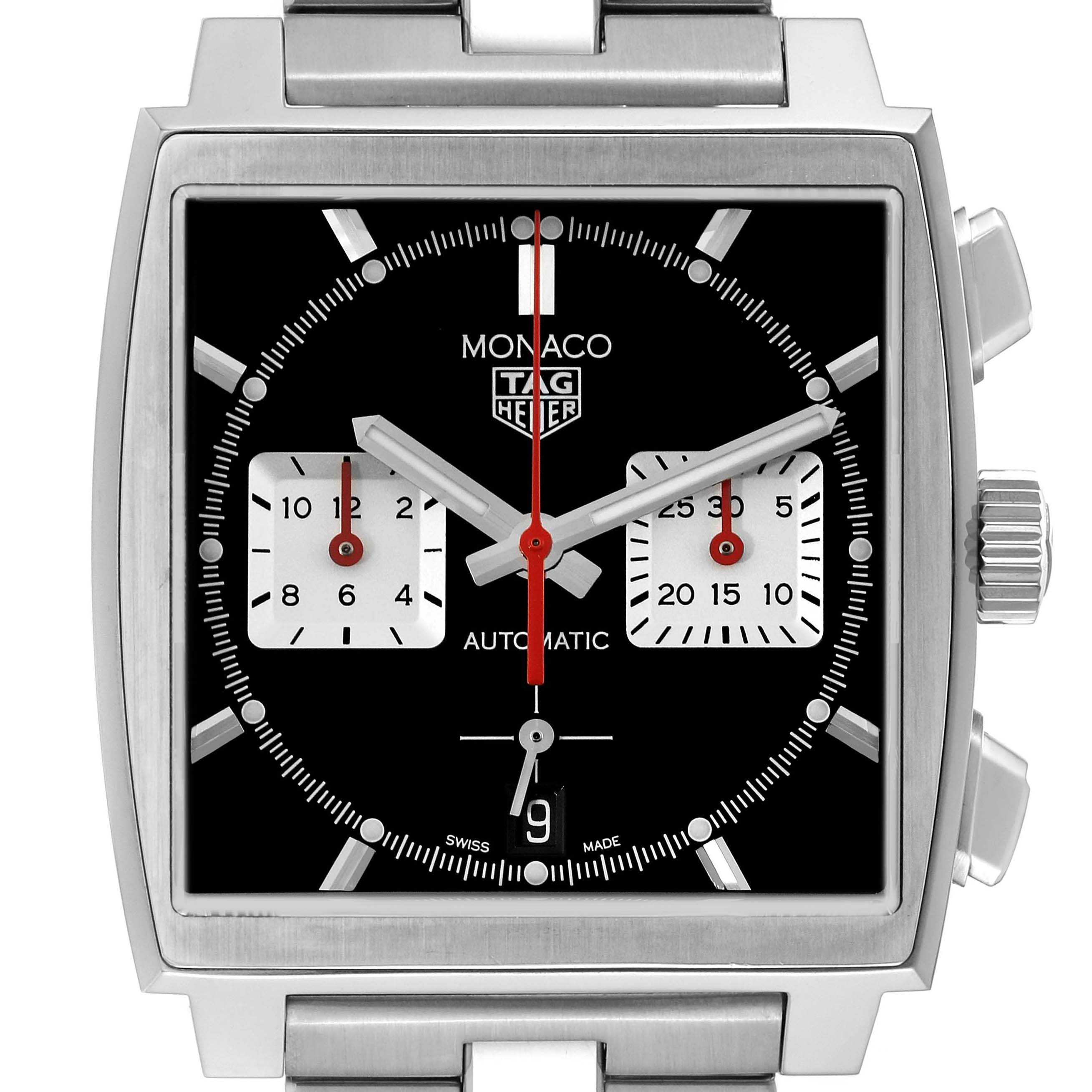 The TAG Heuer Monaco watch is shown from the front, highlighting the black dial, subdials, and stainless steel case.