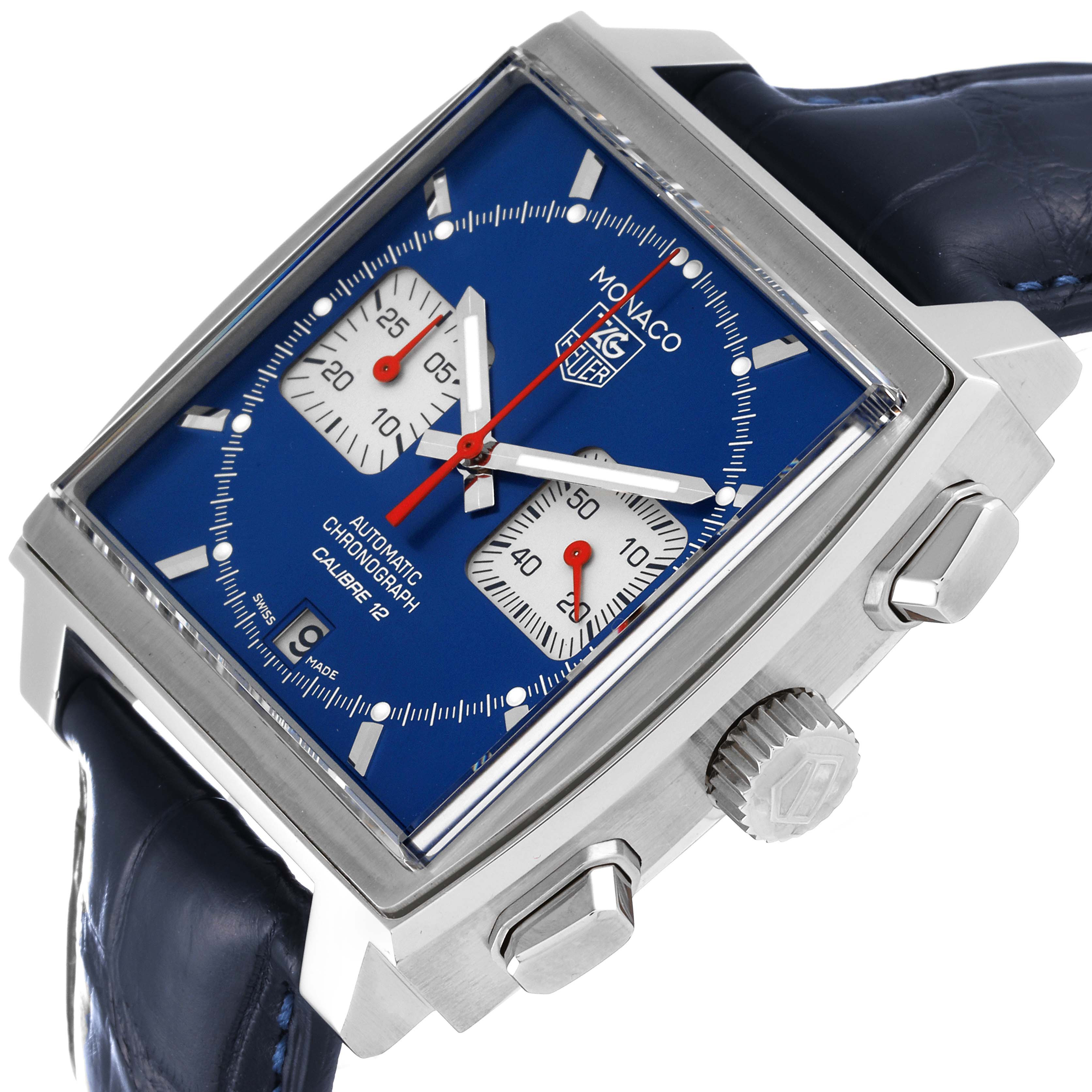 The image shows a side angle of the Tag Heuer Monaco CAW2111 Men's Stainless Steel Blue Dial CAW2111 Men's Stainless Steel Blue Dial watch, highlighting the case, dials, crown, and leather strap.