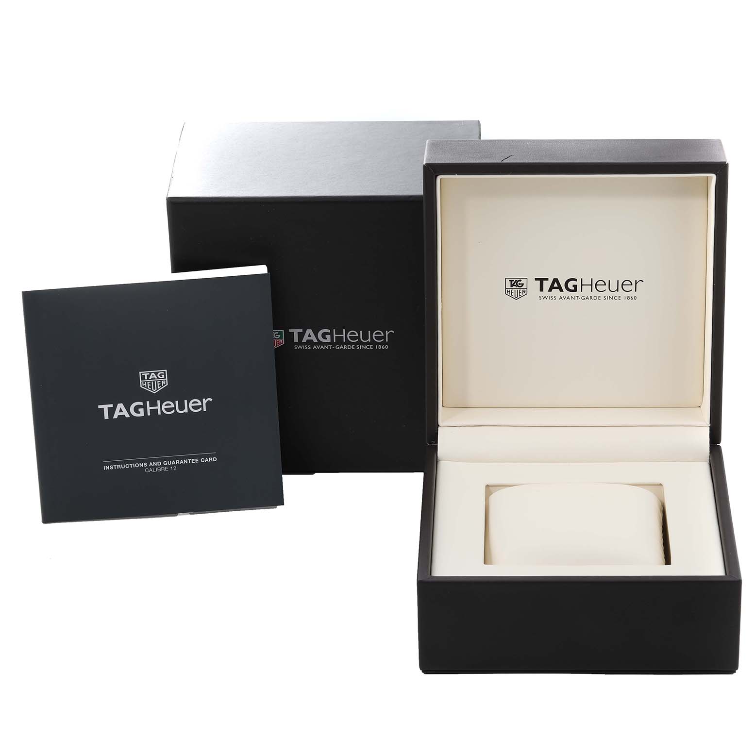 The image shows the packaging, box, and instruction manual for a Tag Heuer Monaco CAW2111 Men's Stainless Steel Blue Dial CAW2111 Men's Stainless Steel Blue Dial model watch.