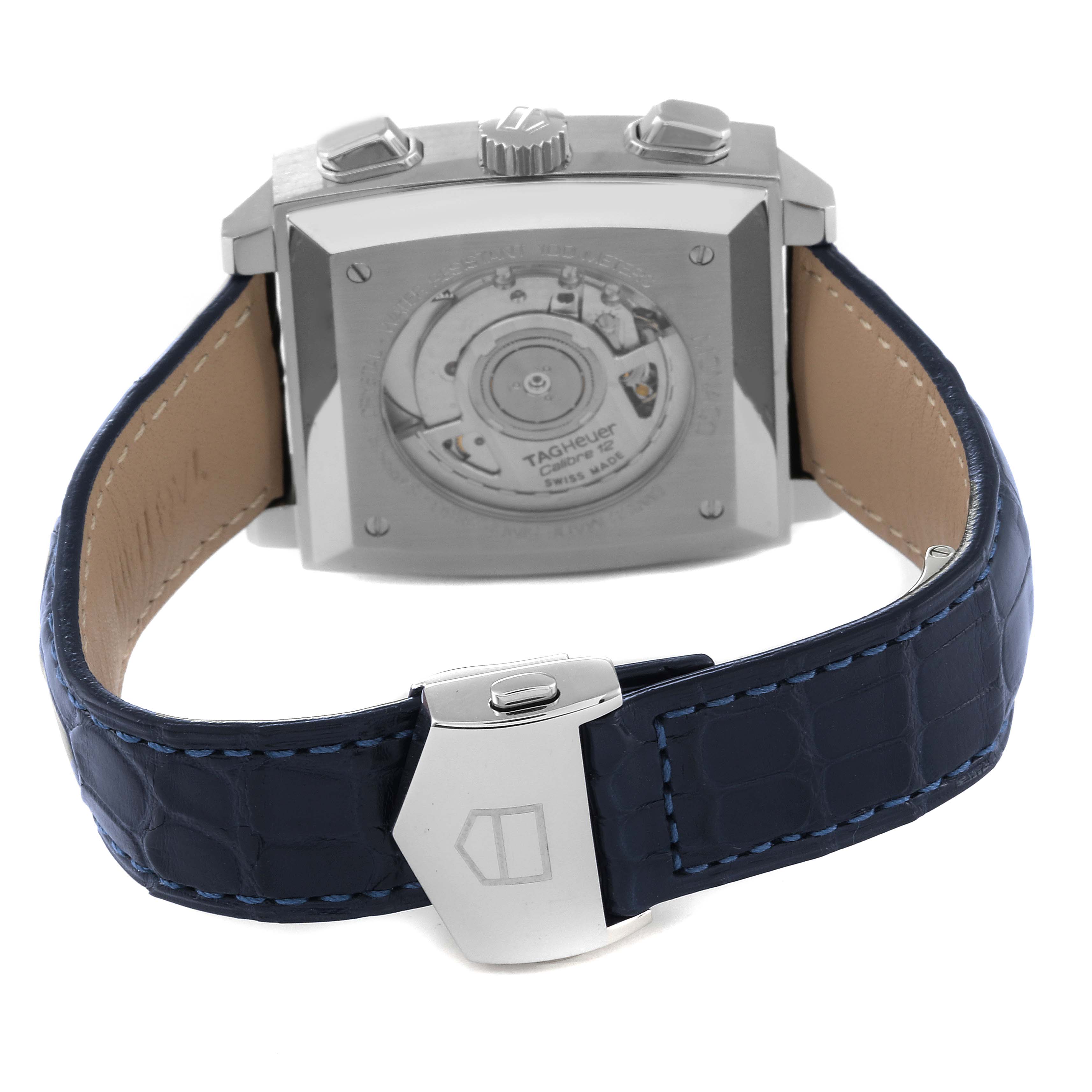 The image shows the back and clasp of the Tag Heuer Monaco CAW2111 Men's Stainless Steel Blue Dial CAW2111 Men's Stainless Steel Blue Dial watch, highlighting its movement through the transparent case back.