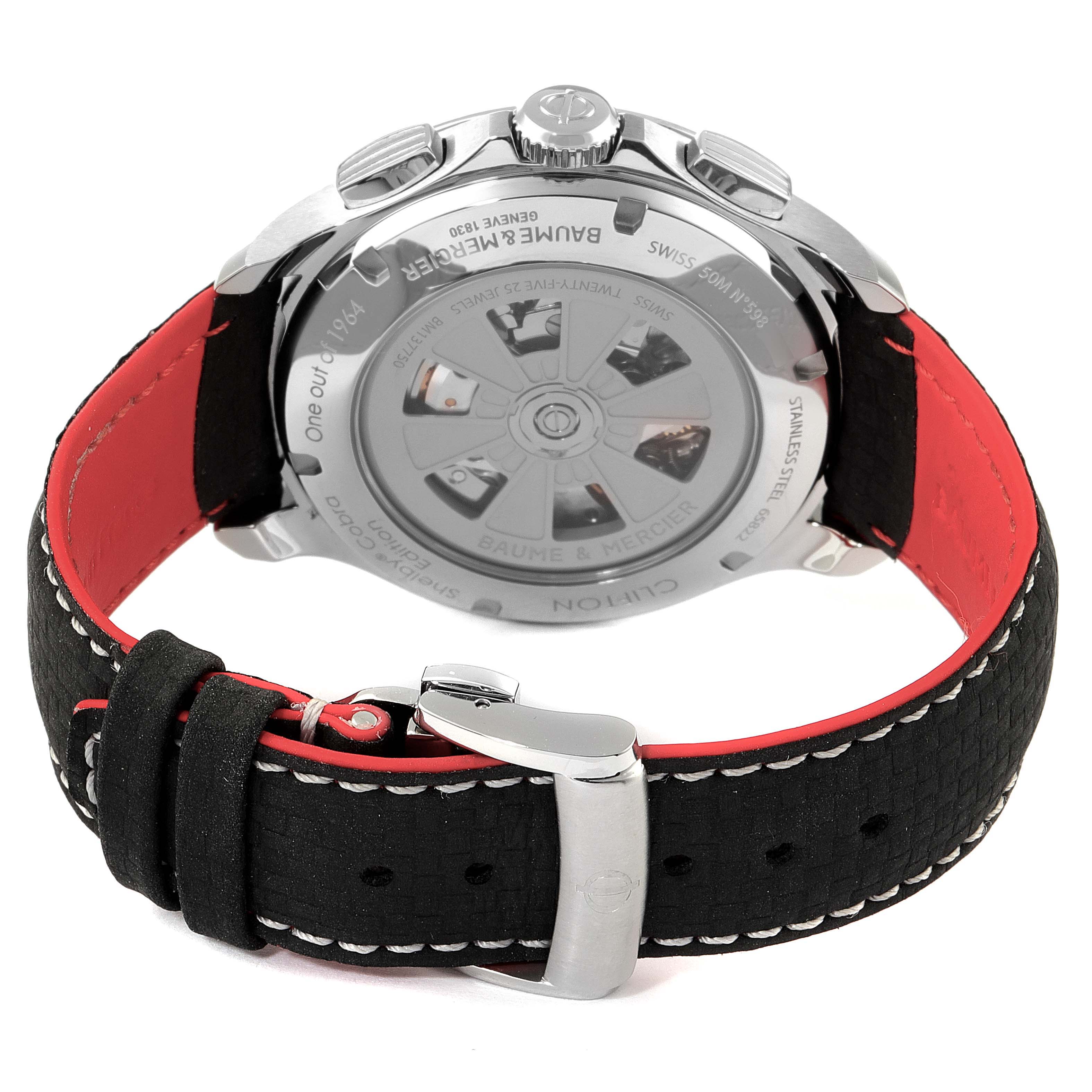 The image shows the back view of a Baume & Mercier Clifton M0A10343 Men's Stainless Steel Blue Dial M0A10343 Men's Stainless Steel Blue Dial watch, highlighting the case back and leather strap with red lining.