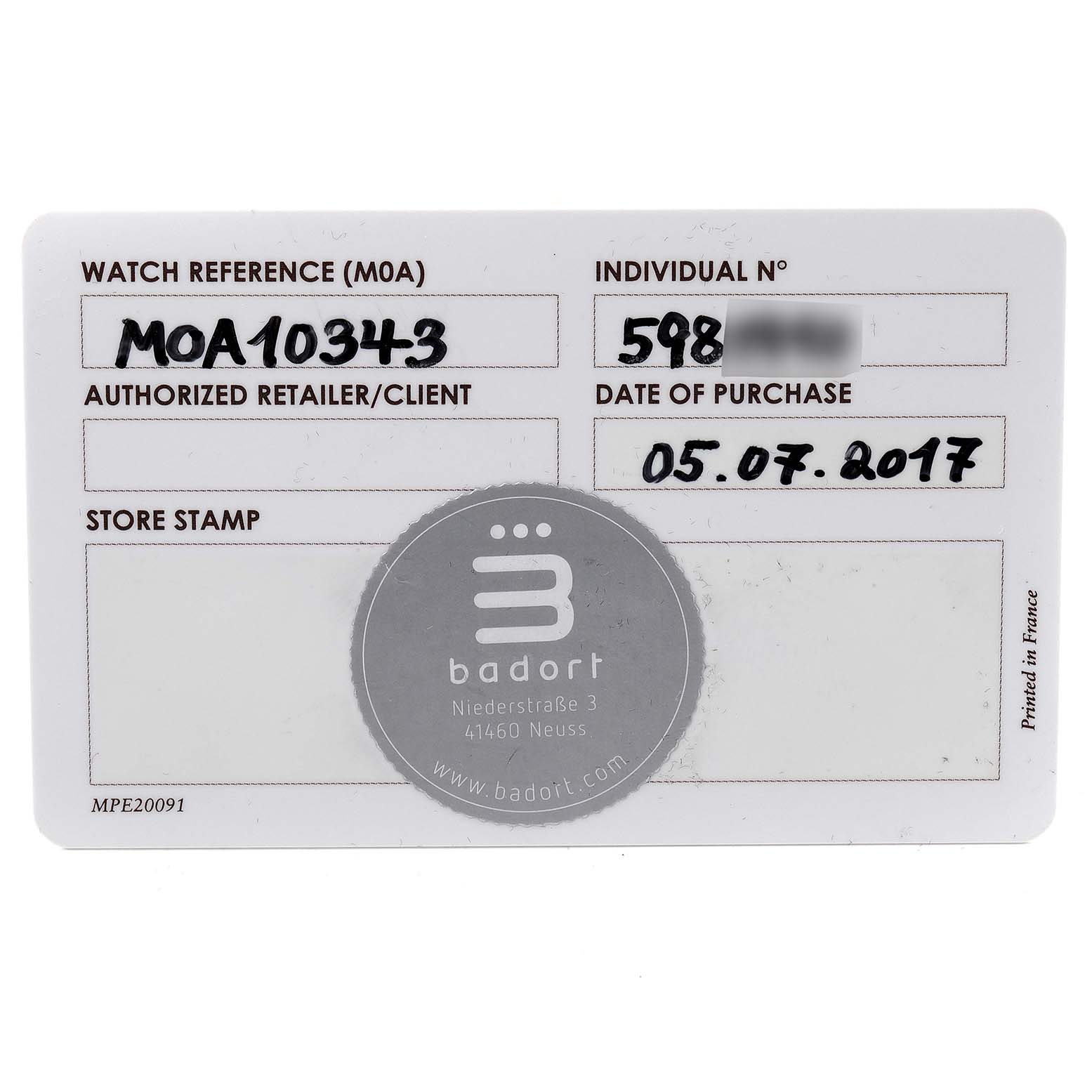 The image shows a warranty card for the Clifton model by Baume & Mercier.