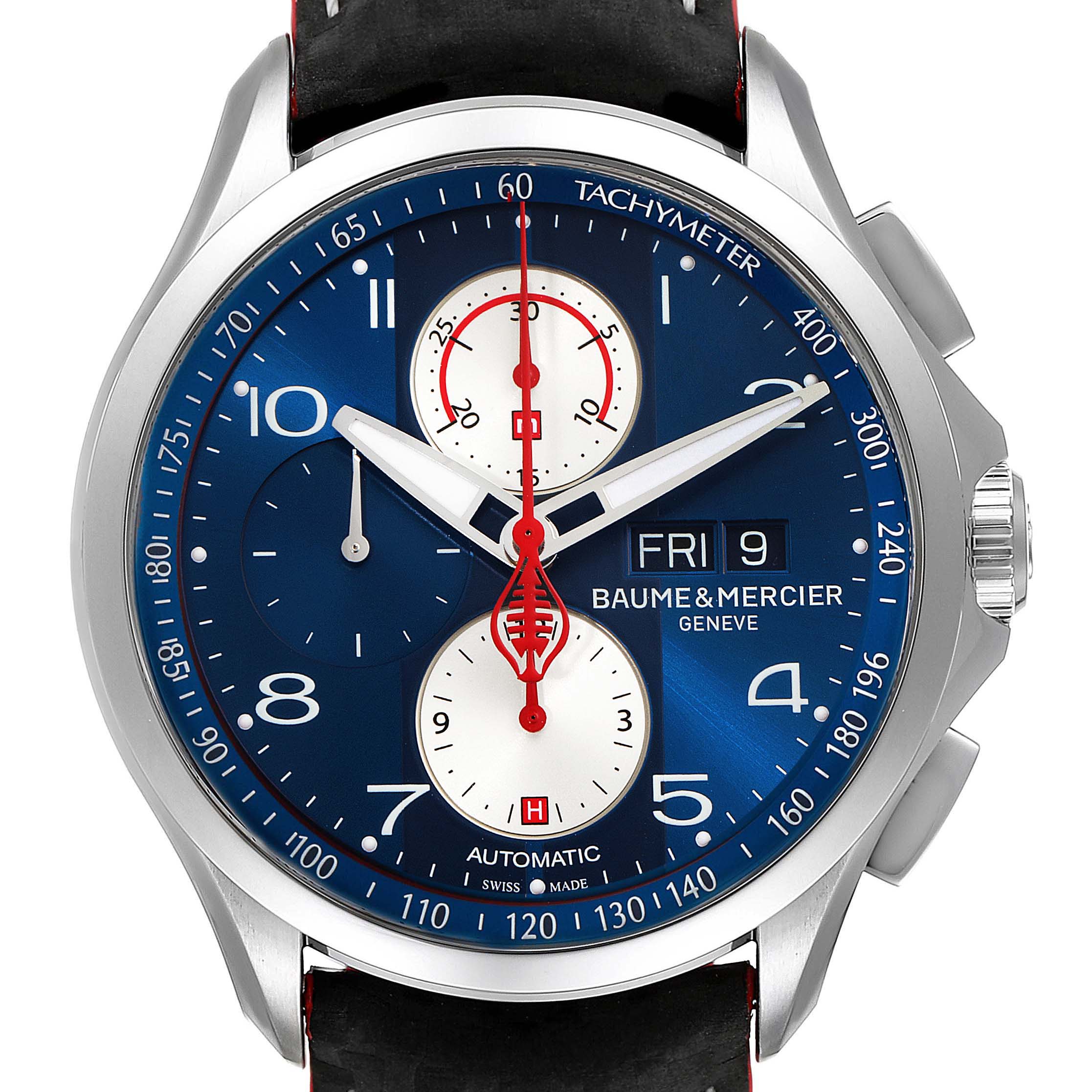 The image shows a front view of a Baume & Mercier Clifton M0A10343 Men's Stainless Steel Blue Dial M0A10343 Men's Stainless Steel Blue Dial watch, highlighting its blue dial, chronograph features, and tachymeter scale.