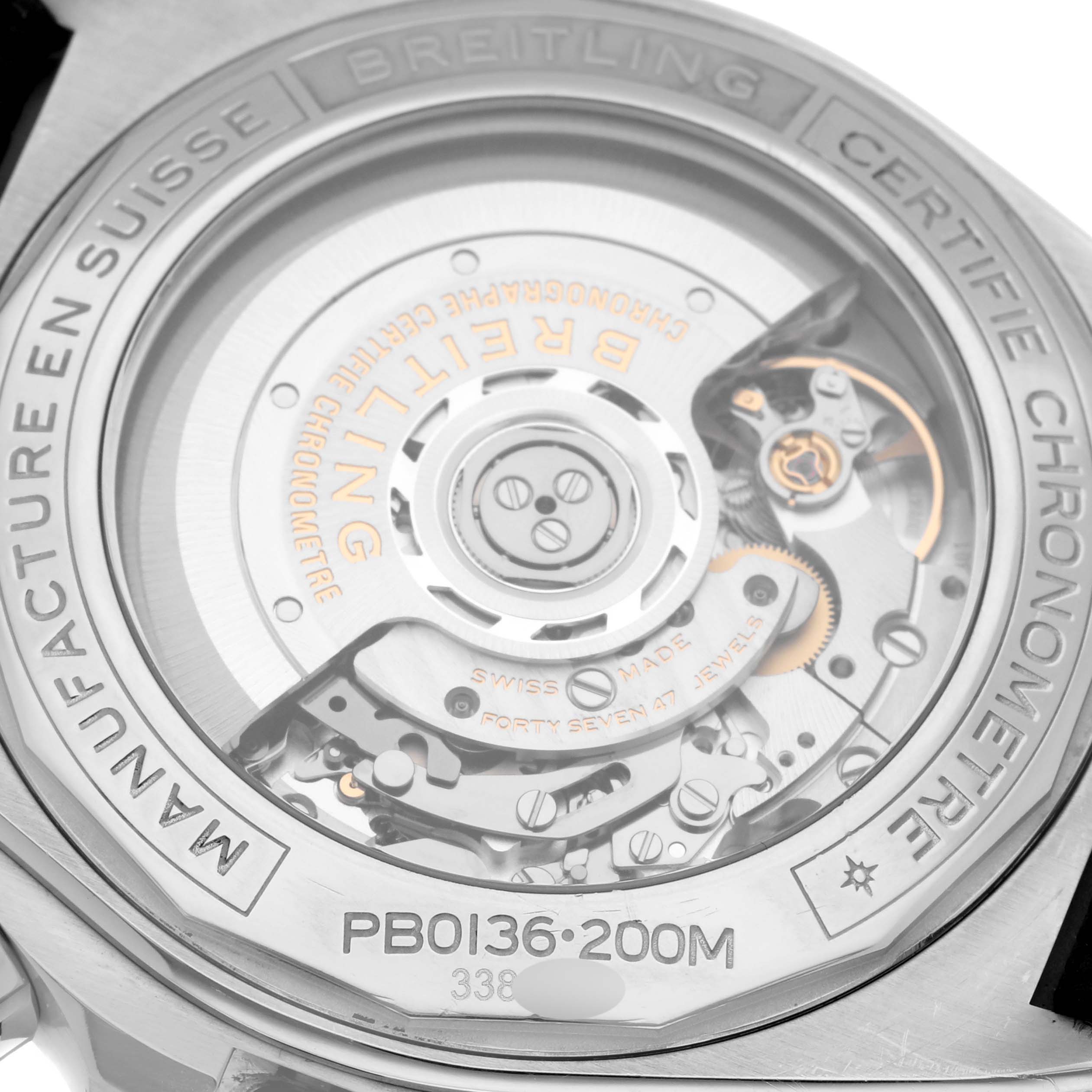 The image shows the back of the Breitling Chronomat PB0136 Men's Stainless Steel Blue Dial PB0136 Men's Stainless Steel Blue Dial watch, highlighting the movement mechanism and engraved details.