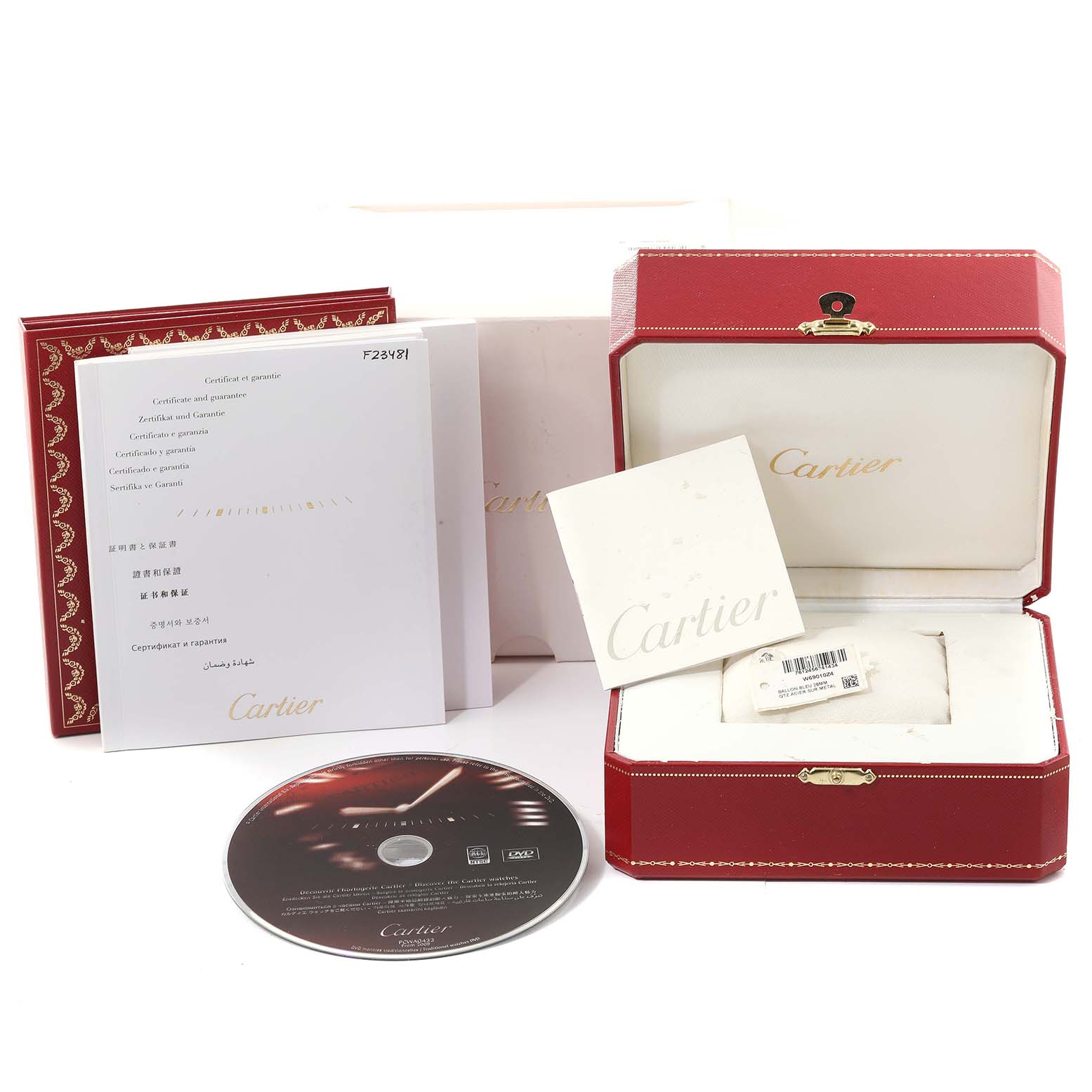 This image shows the packaging and accessories of a Cartier Ballon Bleu W69010Z4 Women
s Stainless Steel Silver Dial W69010Z4 Women
s Stainless Steel Silver Dial watch, including the box, warranty, booklet, and a CD.