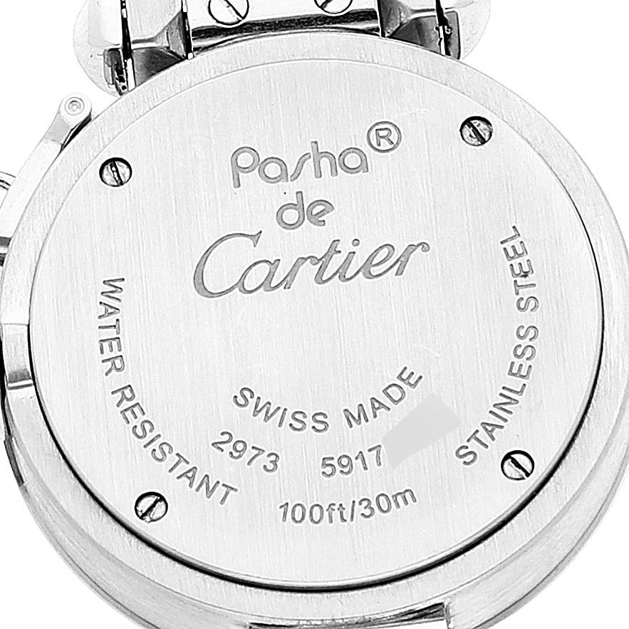 This image shows the back case of a Pasha model watch by Cartier, highlighting engravings for branding, water resistance, and material.