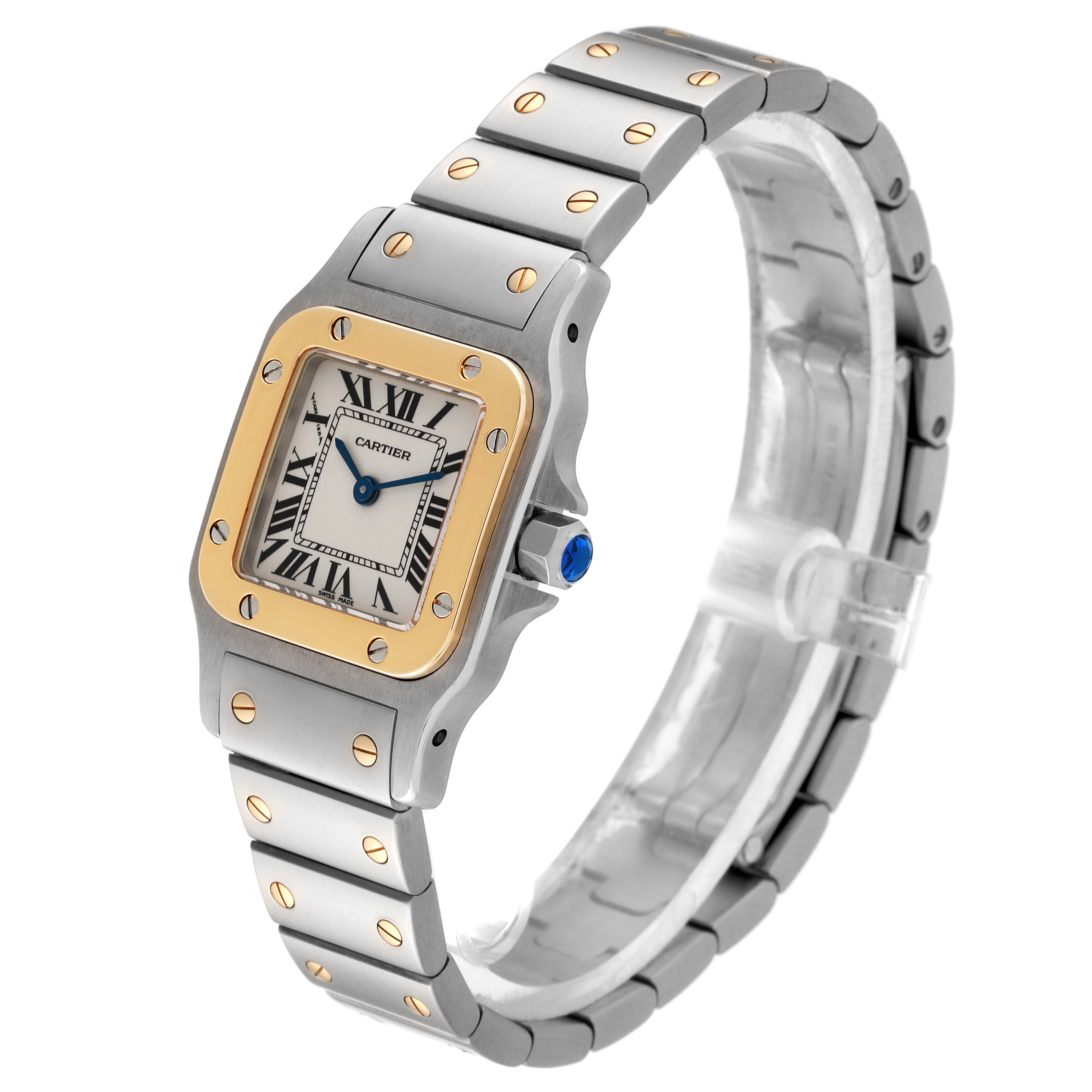 The image shows a Cartier Santos W20012C4 Women's Steel and Gold (two tone) Silver Dial W20012C4 Women's Steel and Gold (two tone) Silver Dial watch from an angled perspective, displaying its dial, bezel, and bracelet.