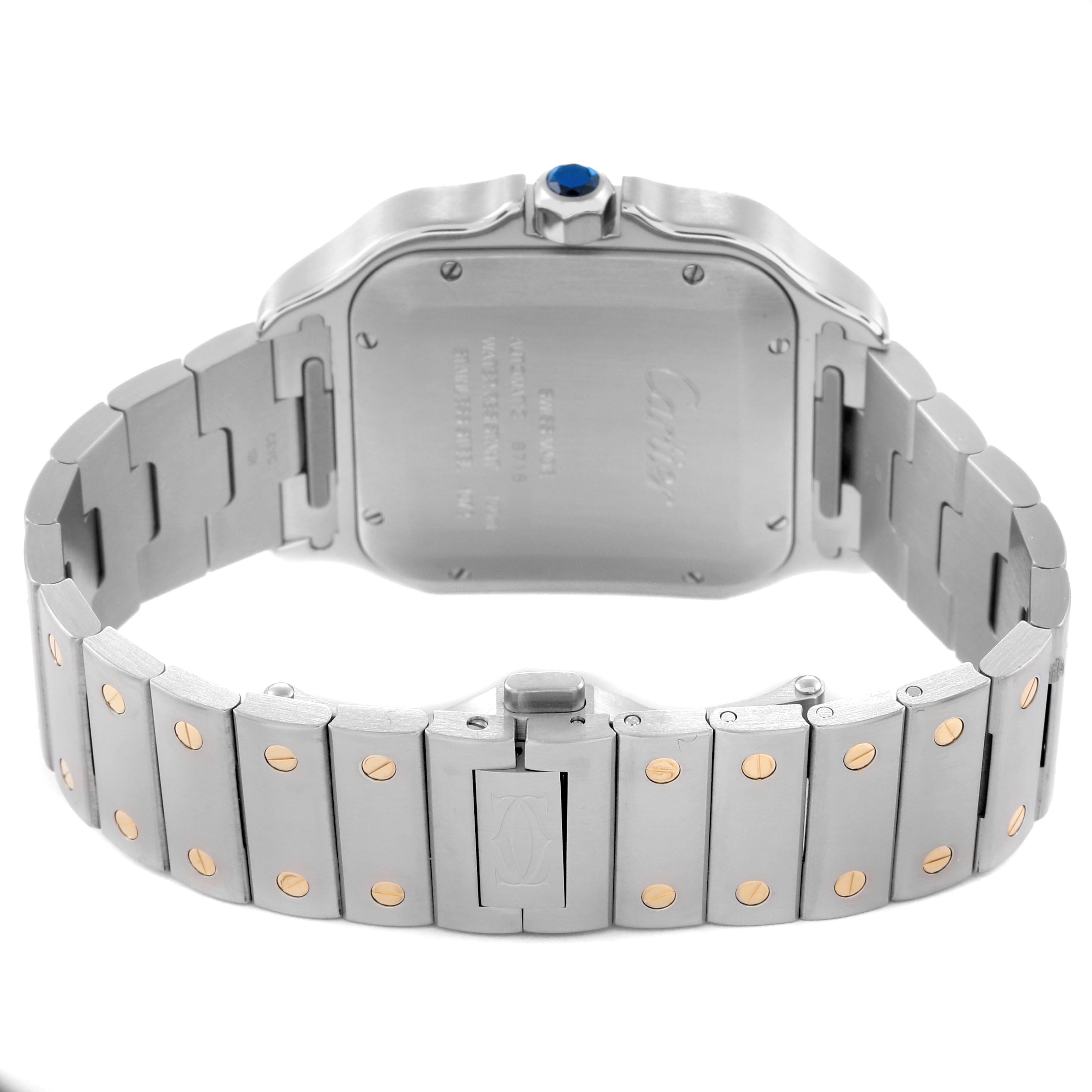 The image shows the back and bracelet of a Cartier Santos W2SA0009 Men's Steel and Gold (two tone) Silver Dial W2SA0009 Men's Steel and Gold (two tone) Silver Dial watch, highlighting the clasp, links, and case back with a visible crown.