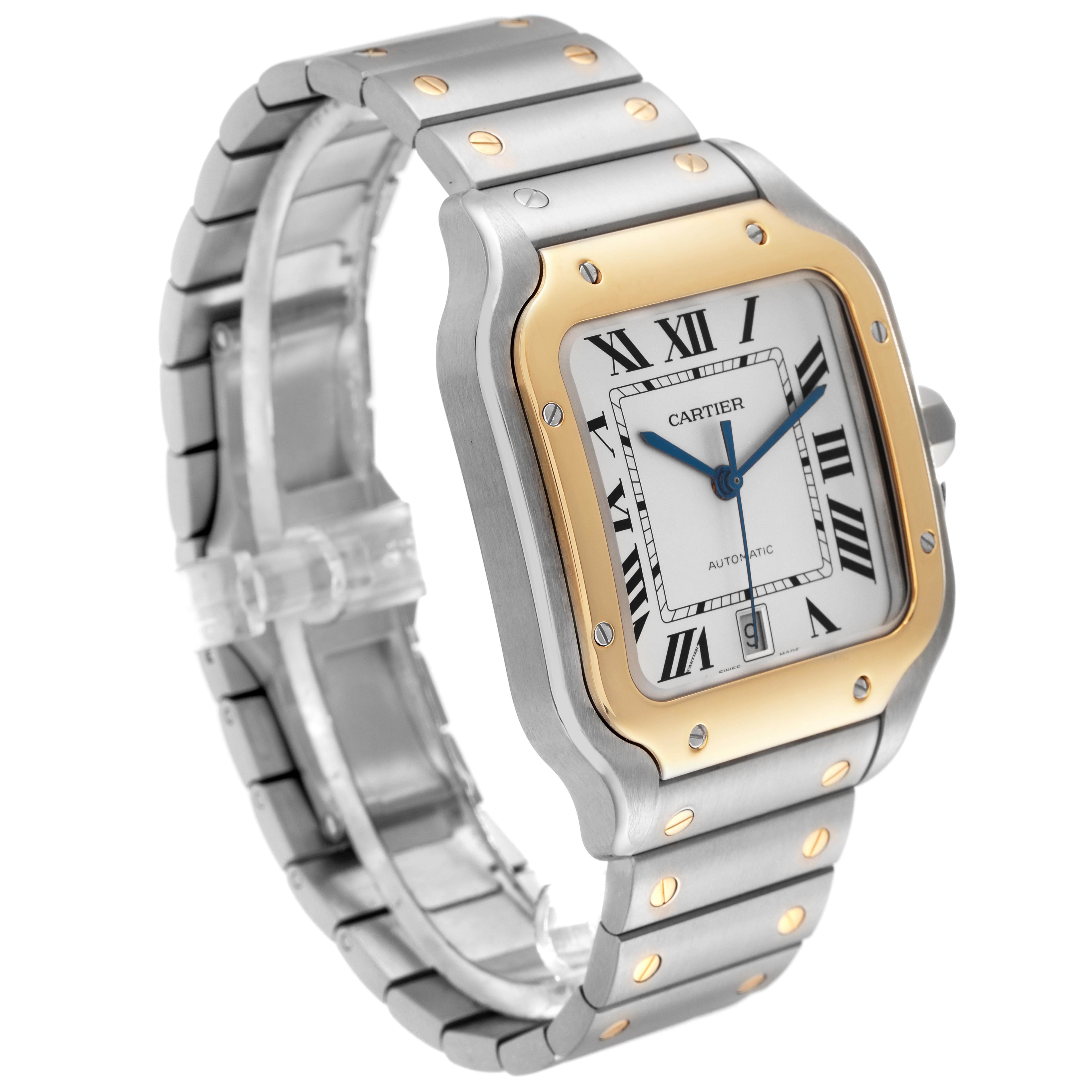 The Cartier Santos W2SA0009 Men's Steel and Gold (two tone) Silver Dial W2SA0009 Men's Steel and Gold (two tone) Silver Dial watch is shown at a three-quarter angle, featuring its face, bezel, bracelet, and crown.