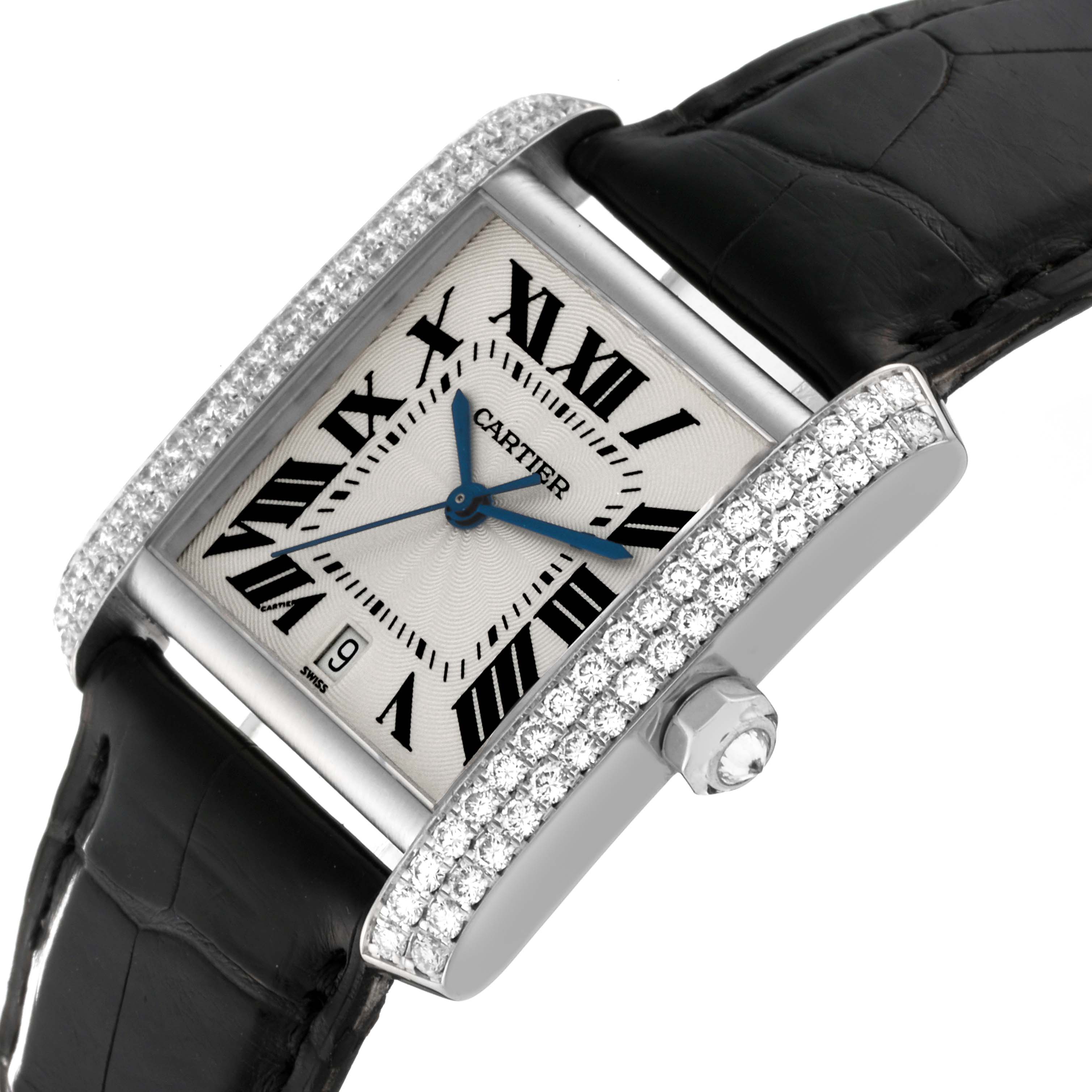 The image shows a close-up of the Cartier Tank Française watch, displaying the diamond-set bezel, dial, and black leather strap.