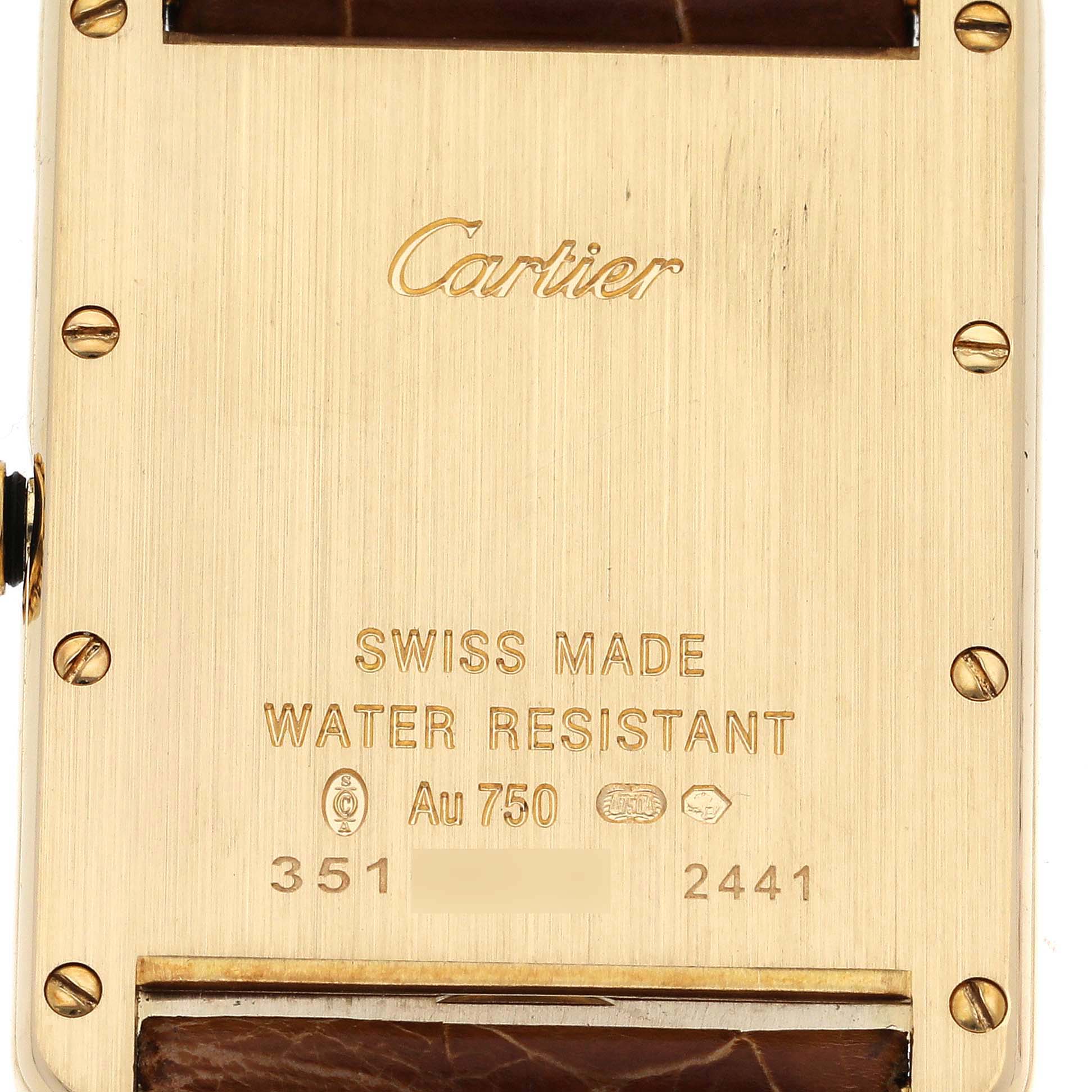 The image shows the back case of a Cartier Tank Louis W1529756 Men's Yellow Gold Silver Dial W1529756 Men's Yellow Gold Silver Dial watch, displaying the brand, model details, and gold markings.