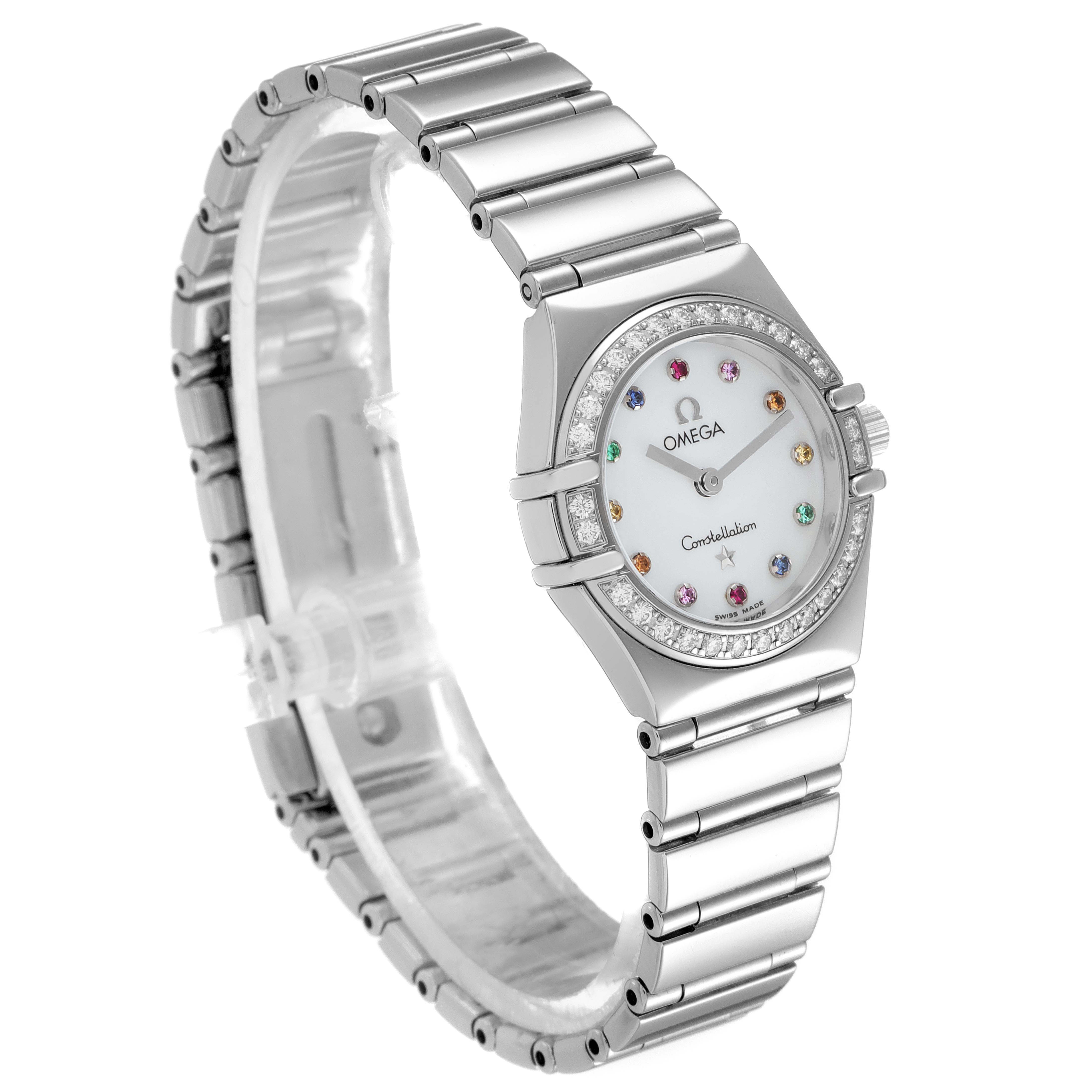 The image shows a side angle view of the Omega 1465.79.00 Women's Stainless Steel Mother of Pearl Dial 1465.79.00 Women's Stainless Steel Mother of Pearl Dial Constellation Iris Rainbow Multi Stone Steel Ladies Watch 1476.79.00, displaying its face and band.