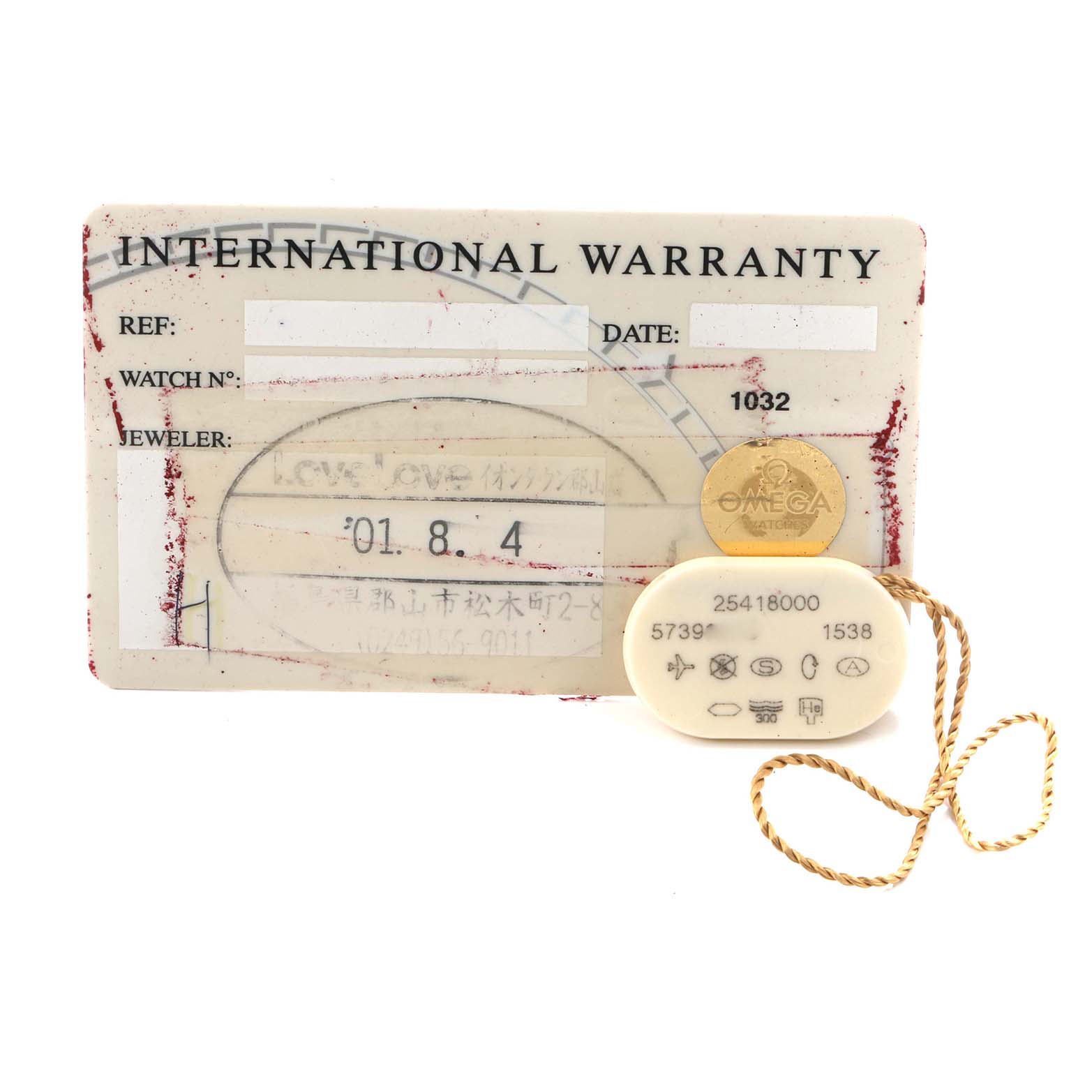 The image shows an international warranty card and a tag for the Omega Seamaster 2541.80.00 Men
s Stainless Steel Blue Dial 2541.80.00 Men
s Stainless Steel Blue Dial, with visible serial numbers and branding.