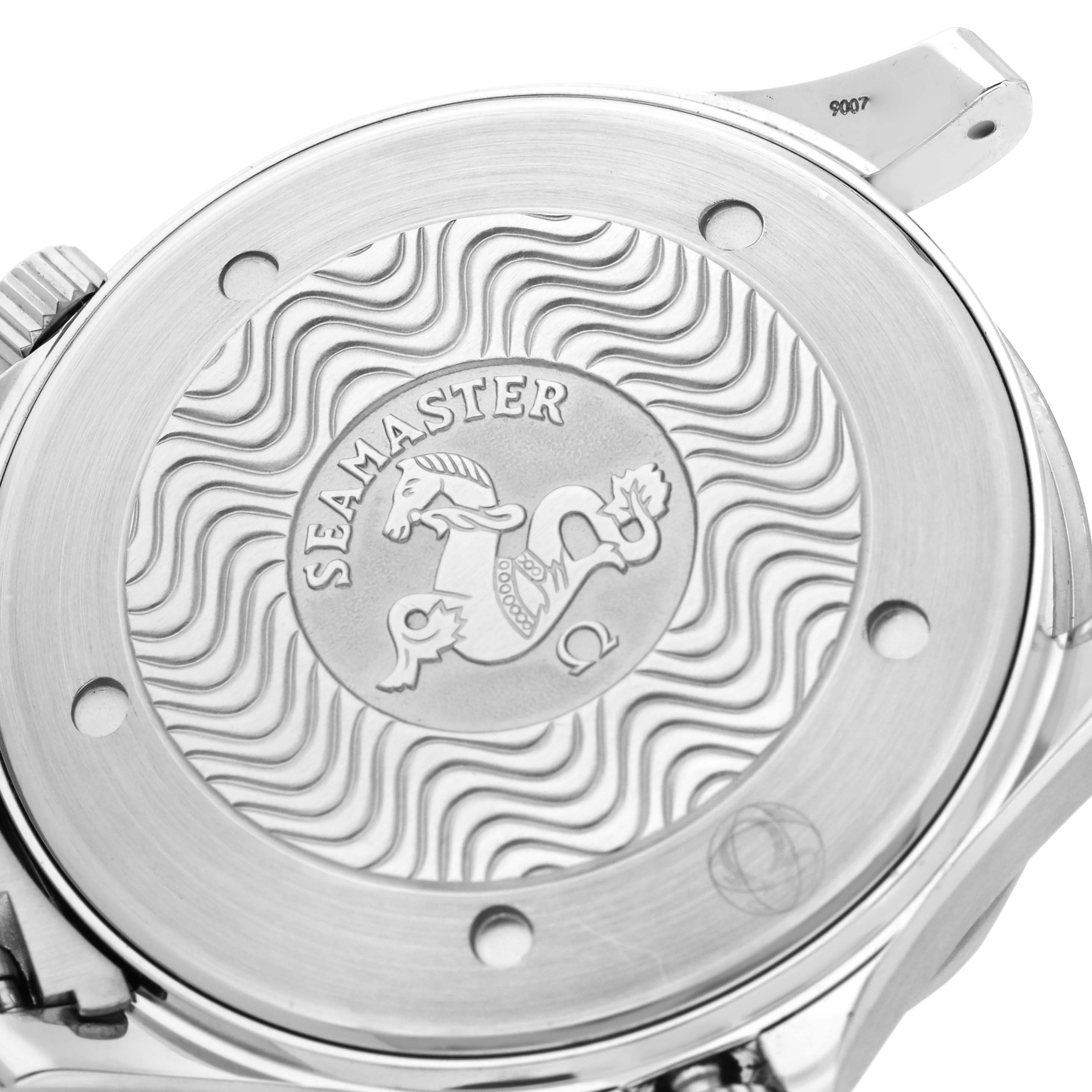 The image shows the back case of an Omega Seamaster 2264.50.00 Men
s Stainless Steel Black Dial 2264.50.00 Men
s Stainless Steel Black Dial watch, featuring wavy engravings and the Seamaster logo.