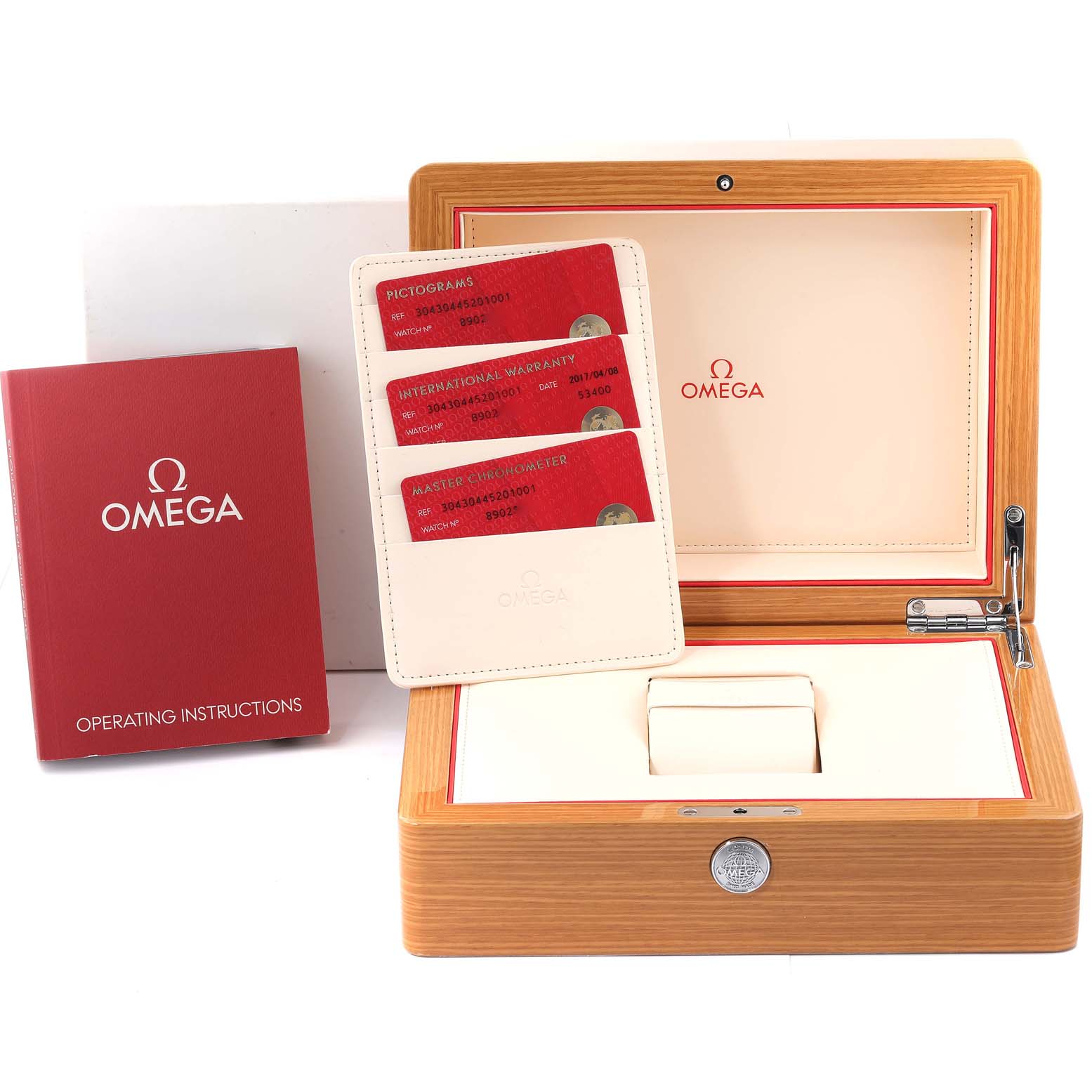 The image shows the Omega Speedmaster 304.30.44.52.01.001 Men's Stainless Steel Black Dial 304.30.44.52.01.001 Men's Stainless Steel Black Dial packaging, including its watch box, operating instructions, and warranty cards.